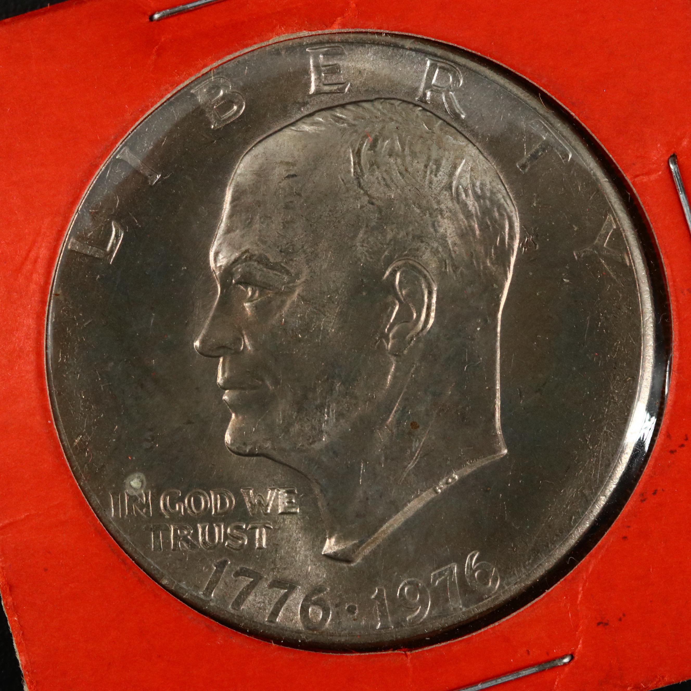 Large Assortment of Kennedy Clad Half Dollars and Eisenhower Clad Dollars