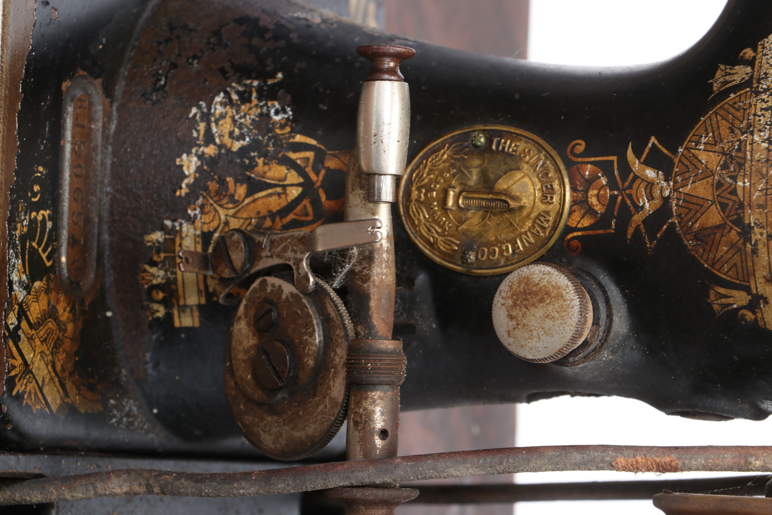 Oak and Cast Iron Singer Sewing Machine and Table, circa 1900