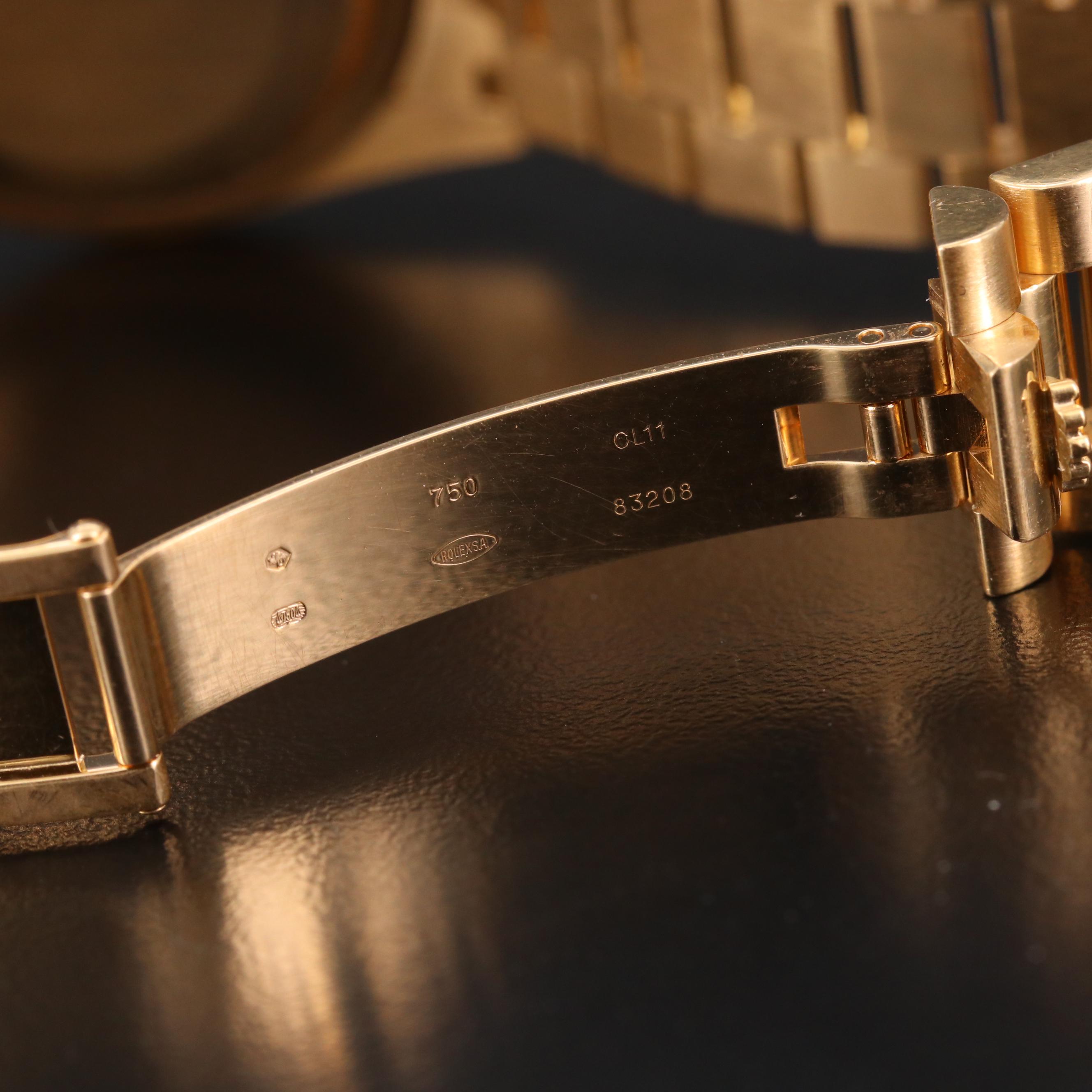 Rolex Day - Date 18K Gold Watch with Ivory Pyramid Dial, 2004