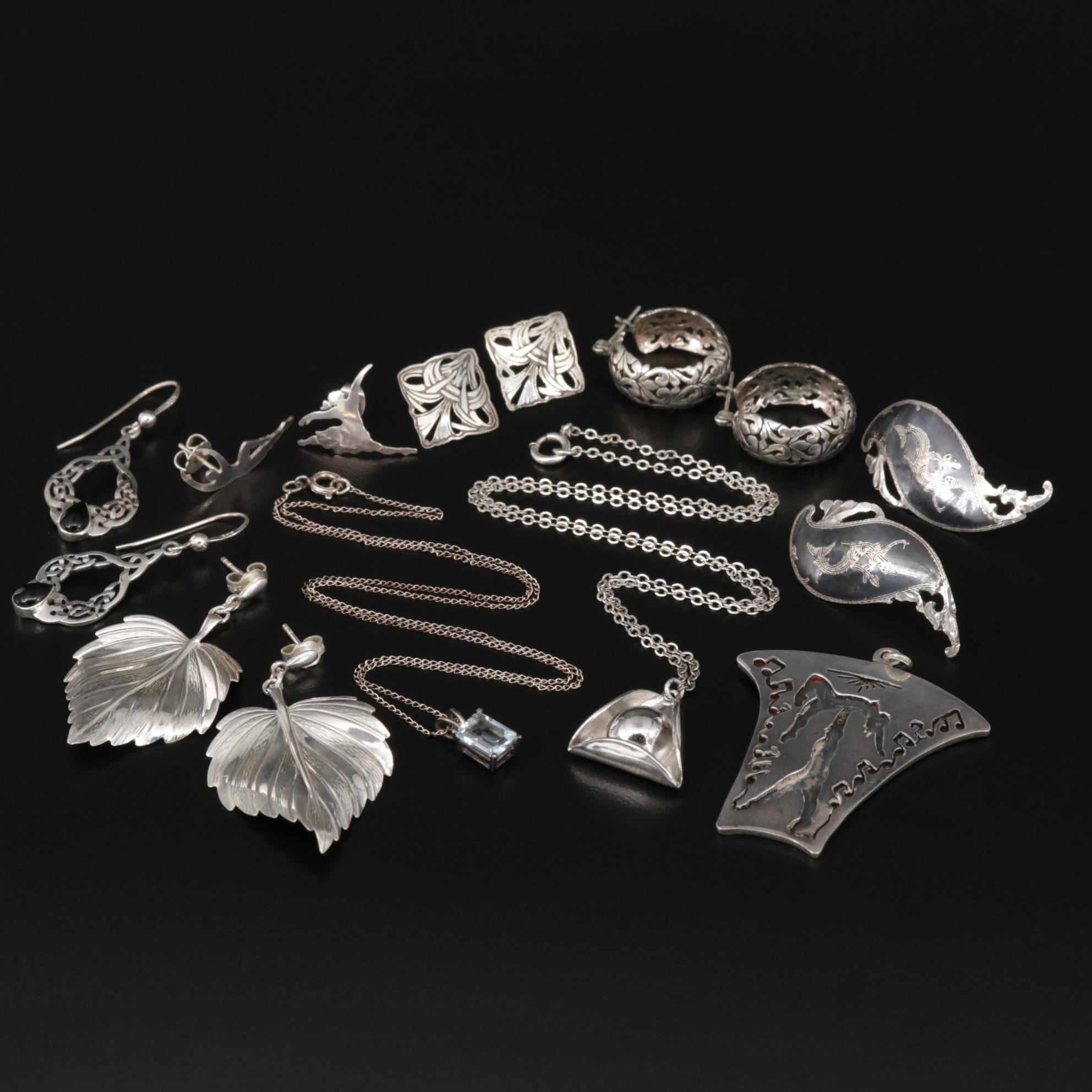 Sterling and 970 Silver Assorted Jewelry Including Black Onyx and Blue Topaz