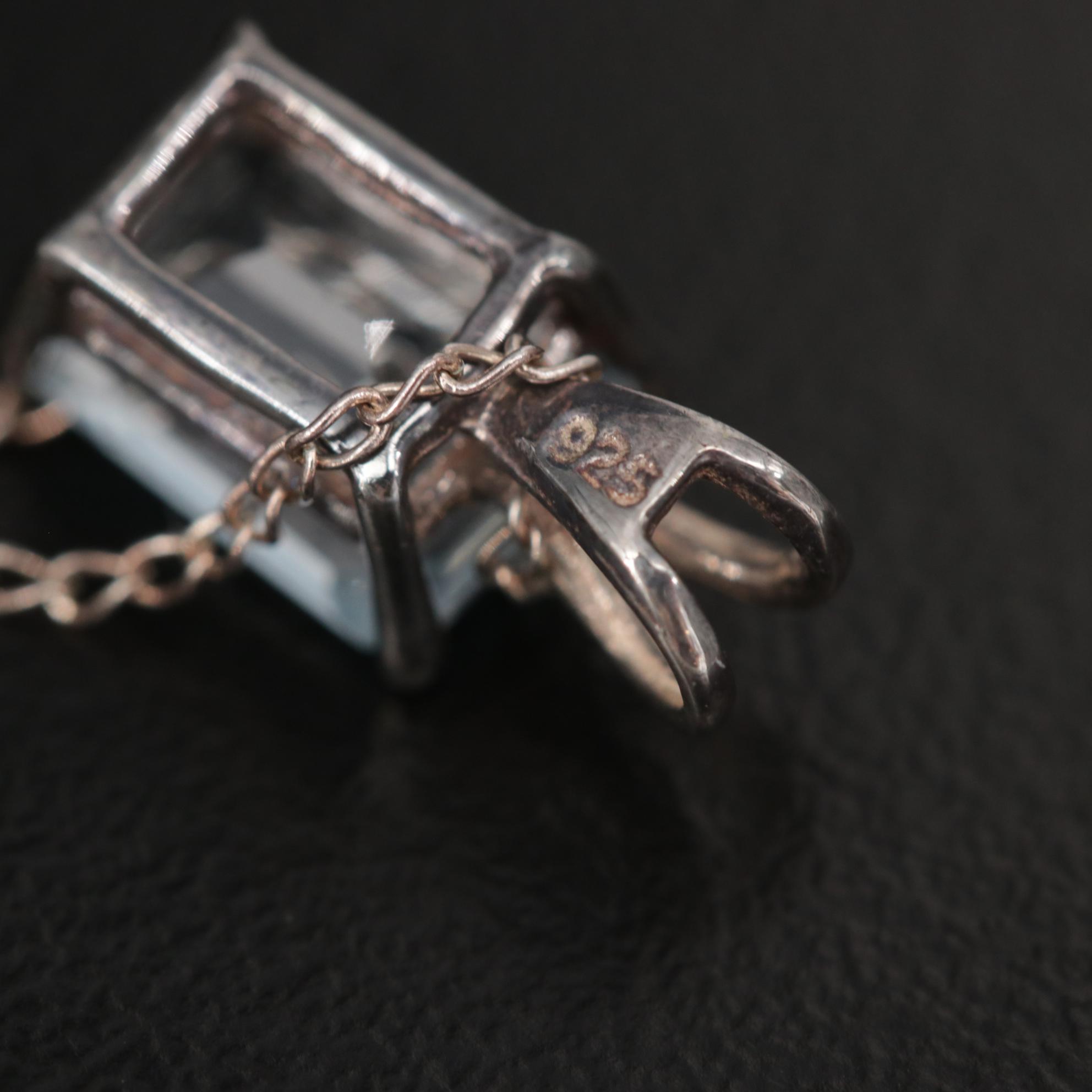 Sterling and 970 Silver Assorted Jewelry Including Black Onyx and Blue Topaz