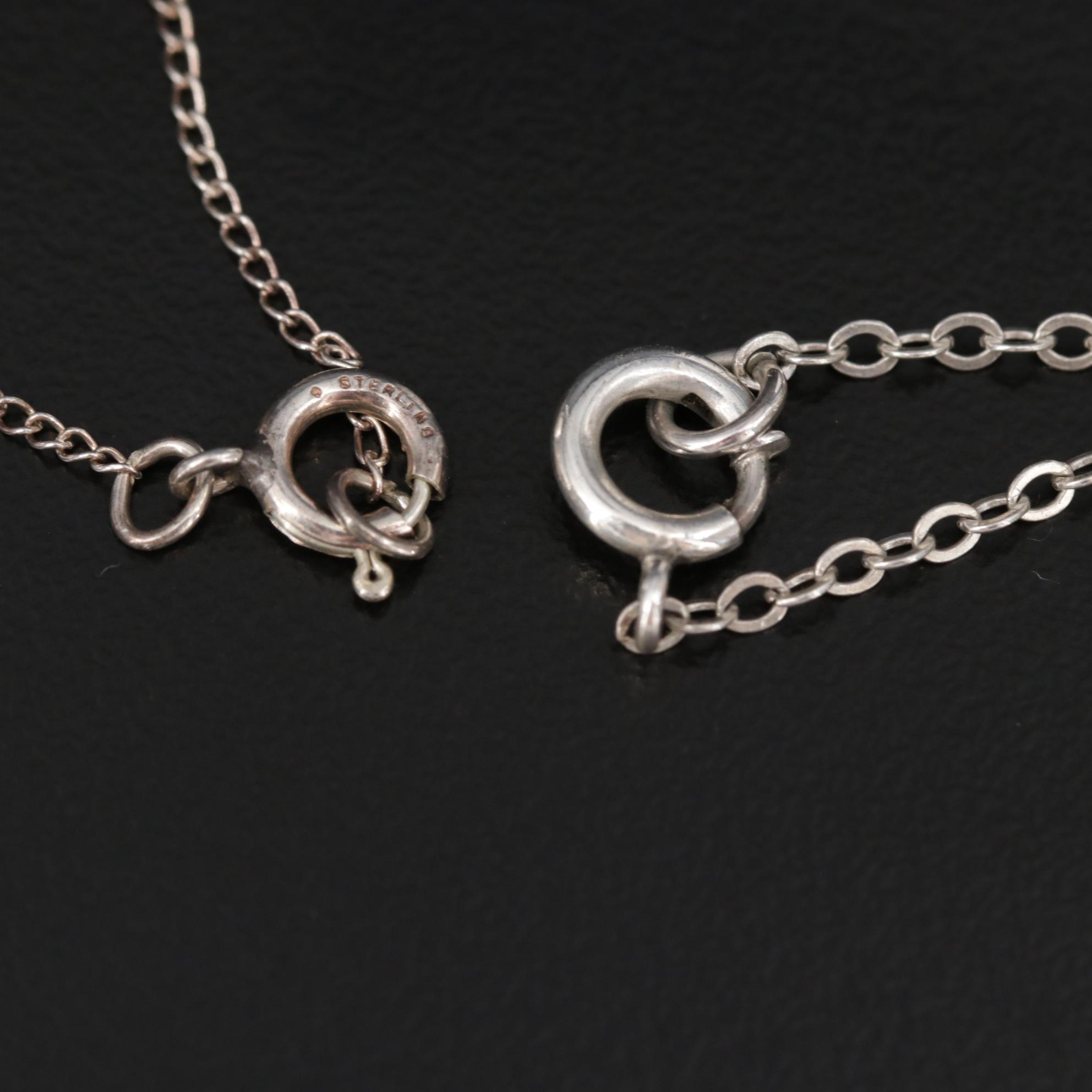 Sterling and 970 Silver Assorted Jewelry Including Black Onyx and Blue Topaz