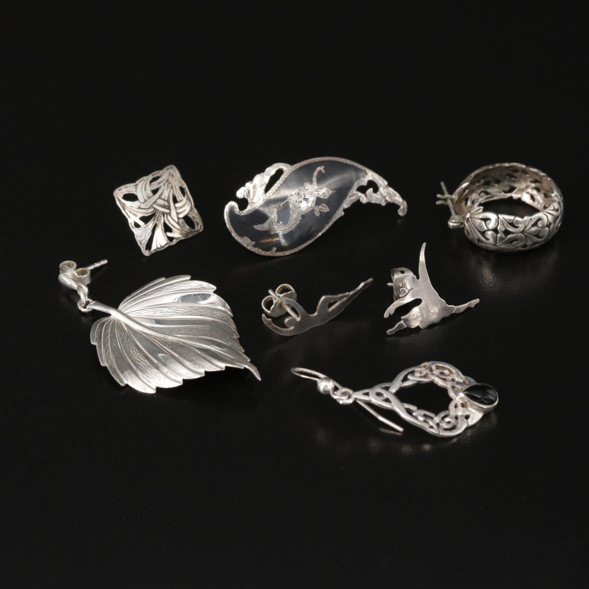 Sterling and 970 Silver Assorted Jewelry Including Black Onyx and Blue Topaz