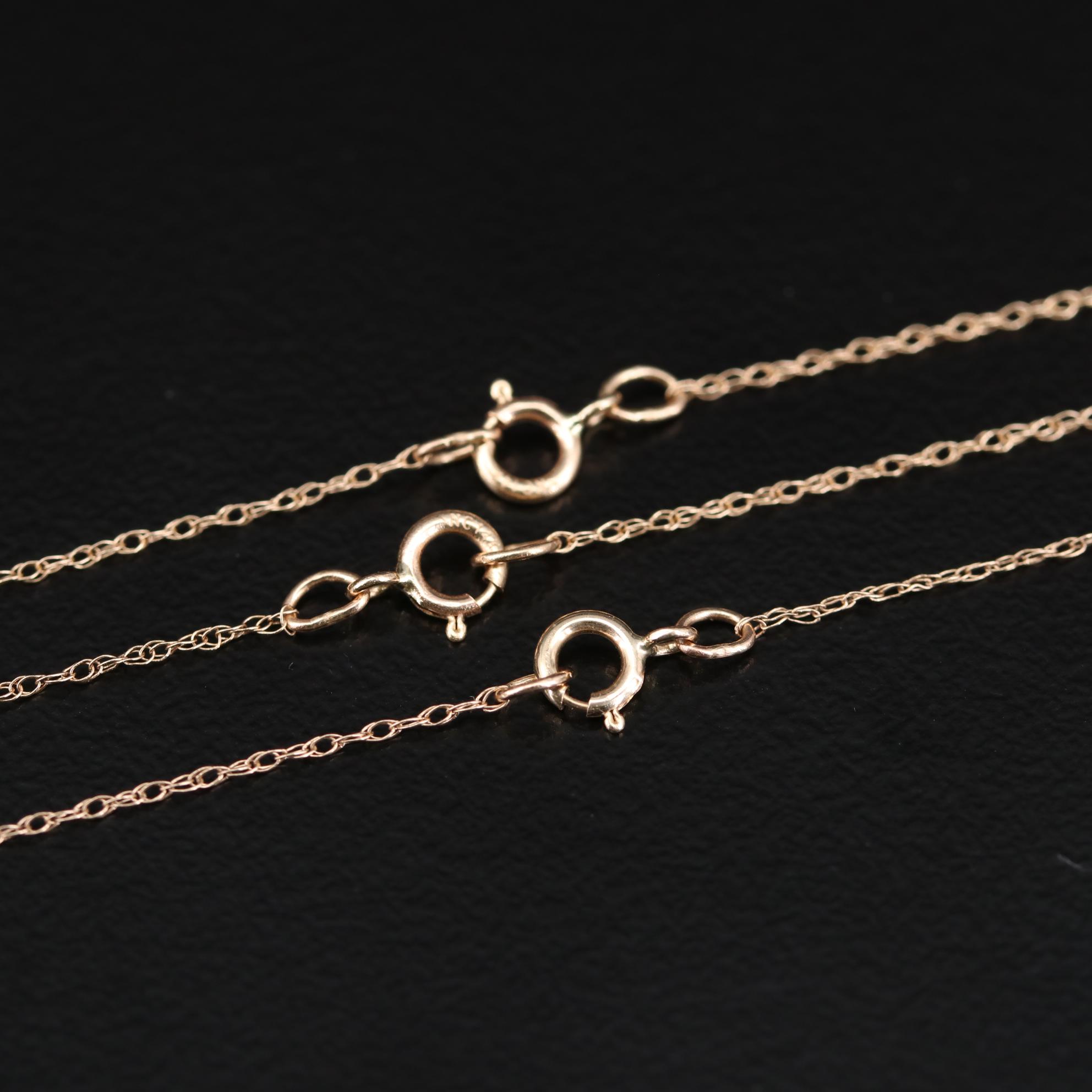 10K and 14K Gold Necklaces with Topaz, Ruby, Emerald, and Diamonds