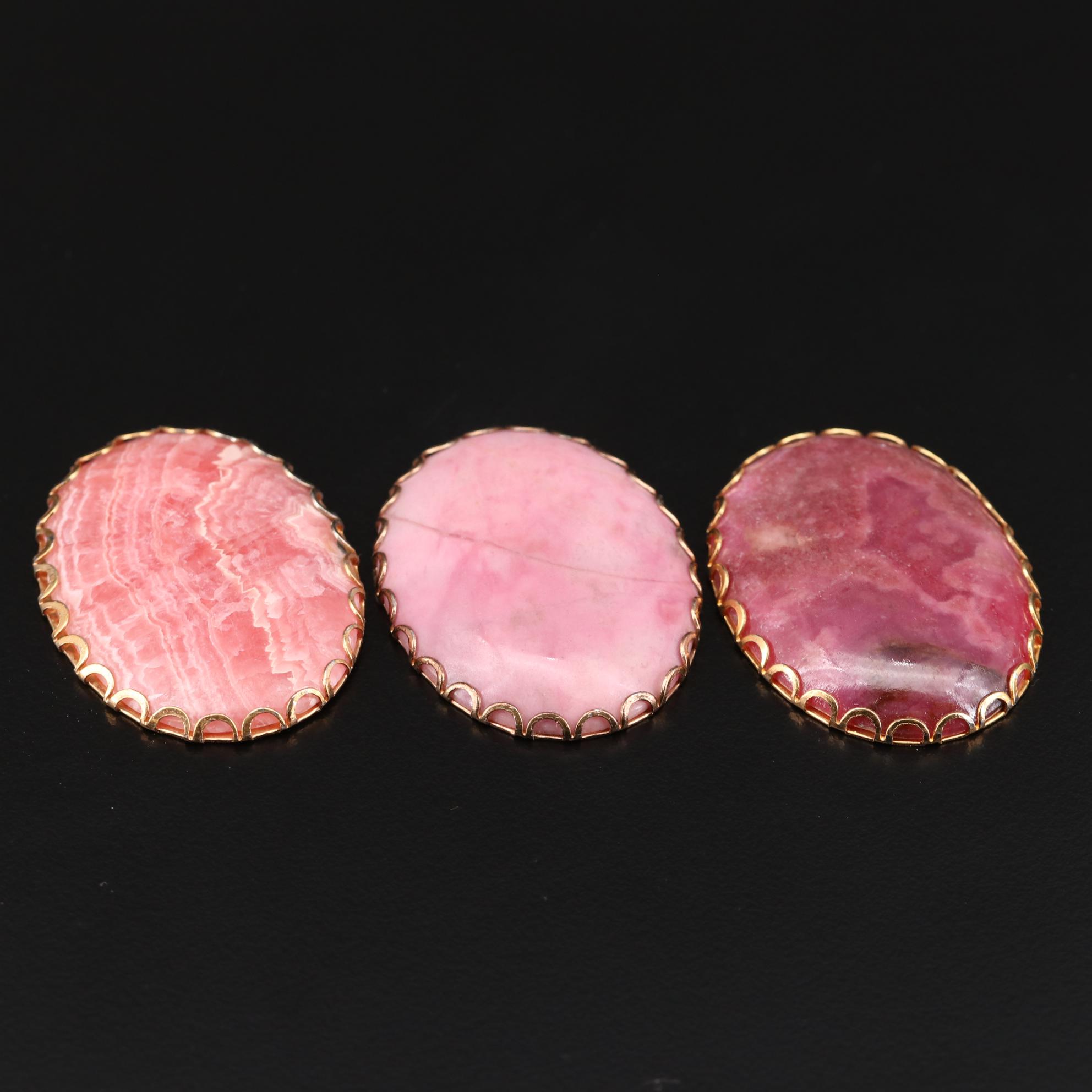 Framed Rhodochrosite and Rhodonite Gemstones