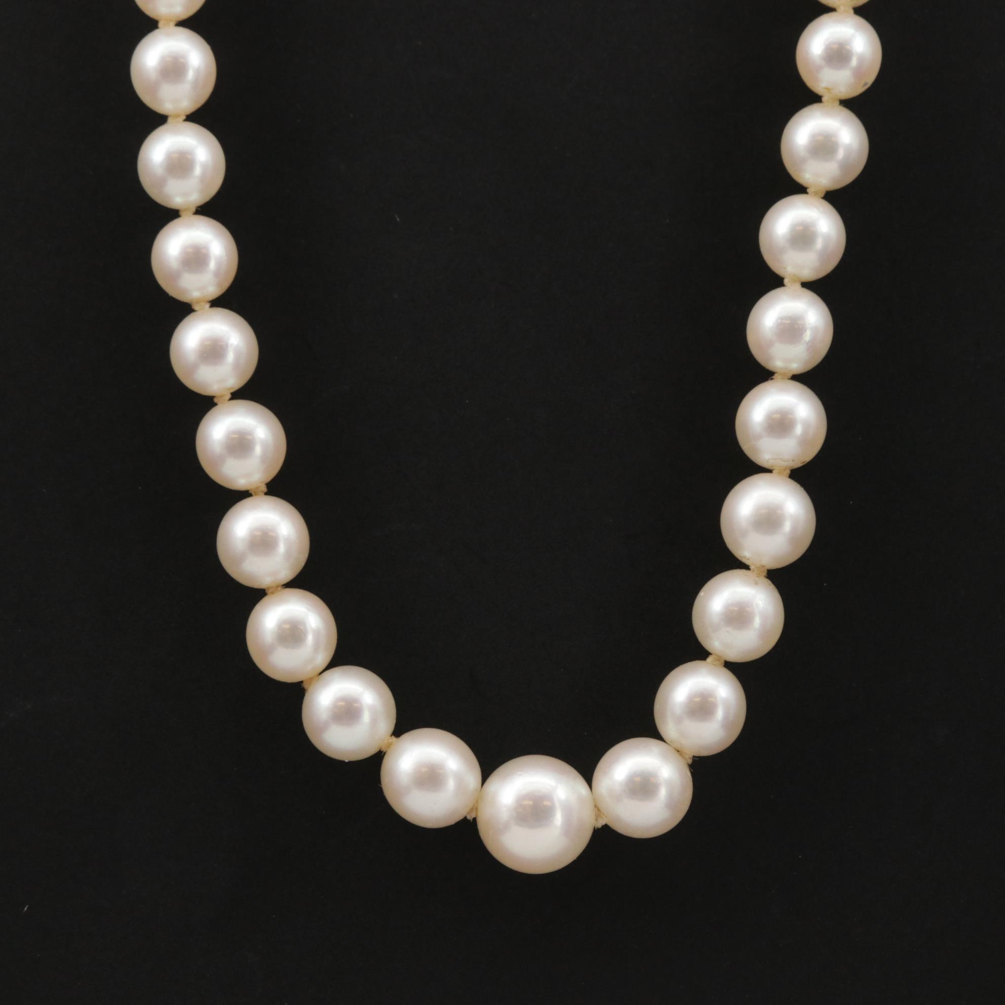 Graduated Strand of Mikimoto Pearls with Sterling Silver Clasp