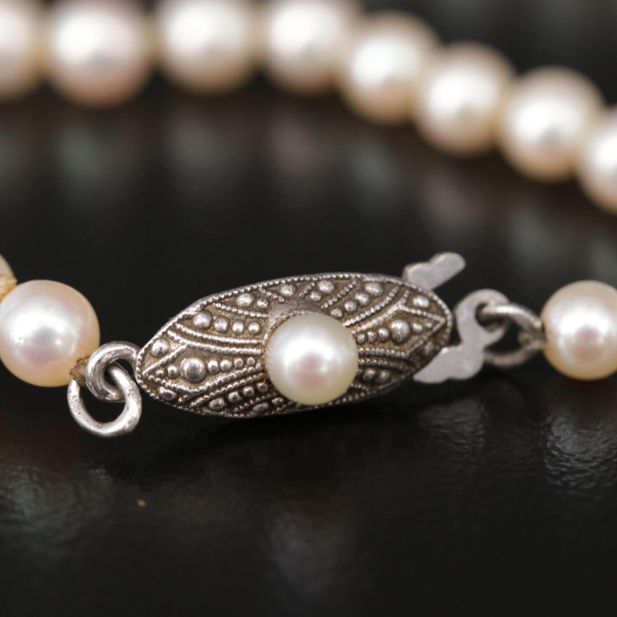 Graduated Strand of Mikimoto Pearls with Sterling Silver Clasp