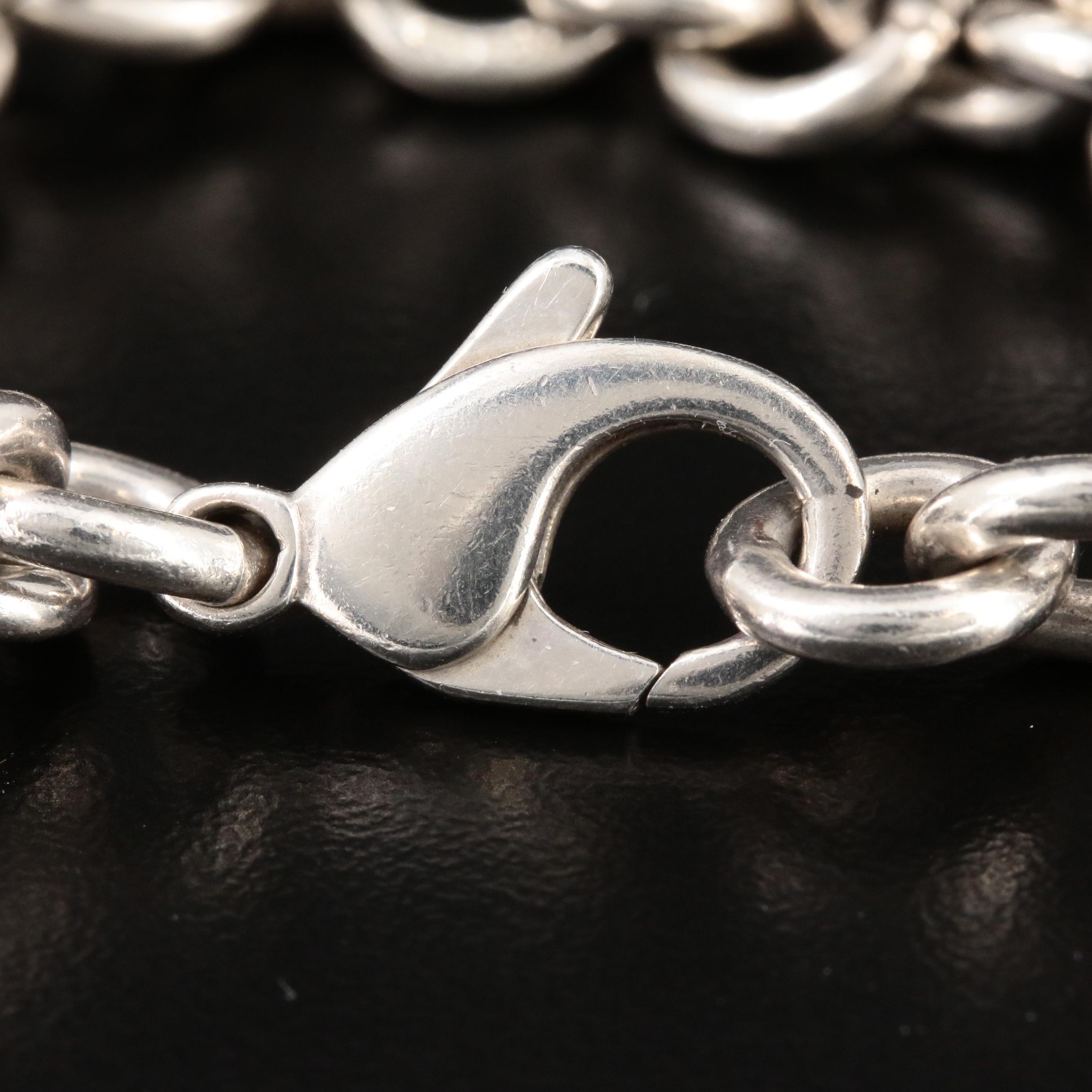 Tiffany & Co. Sterling Silver Travel Themed Charm Bracelet