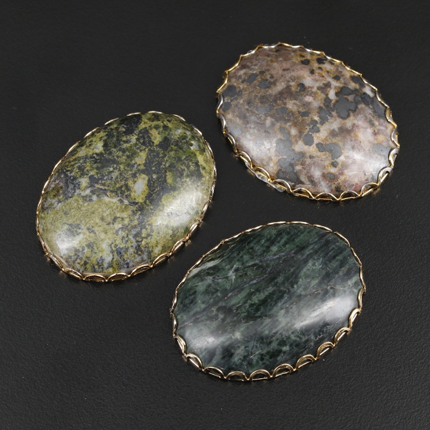 Framed Oval Verde Antique and Jasper Cabochon Mineral Specimens