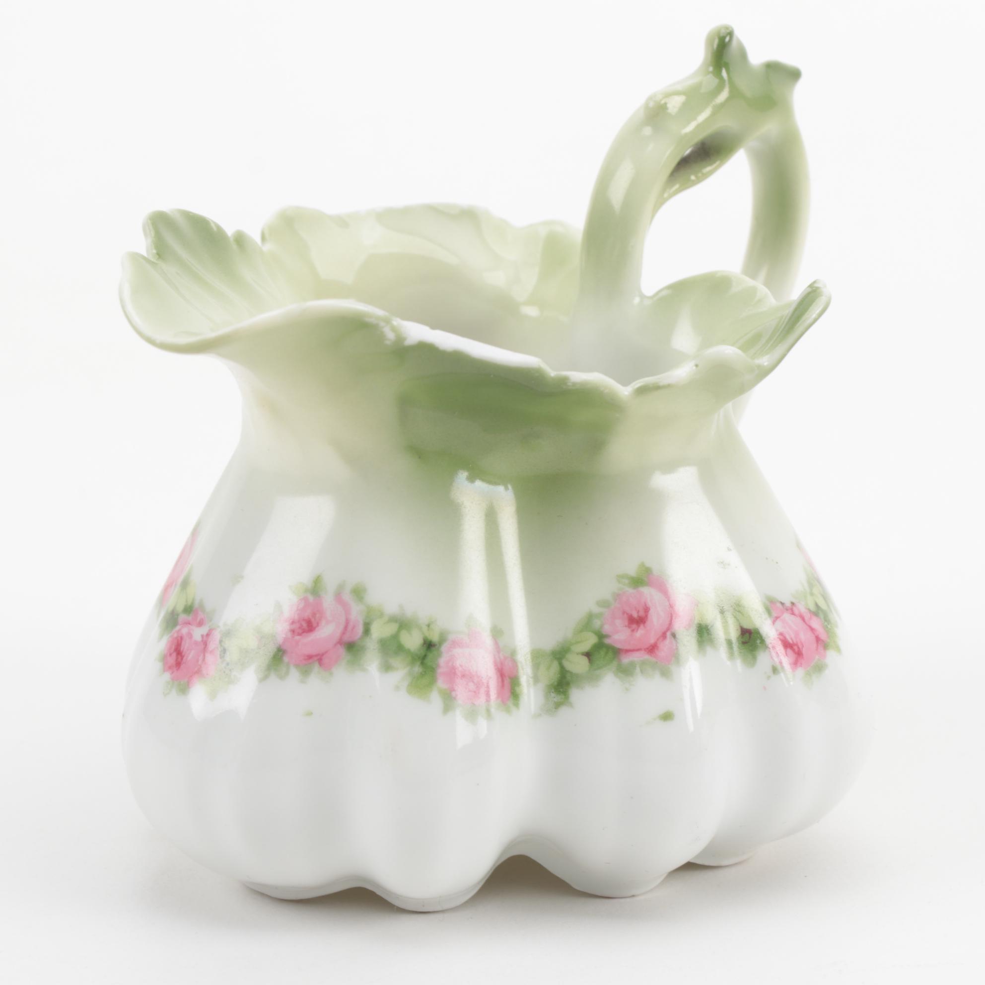 Rudolph Schlegelmilch Porcelain Creamer with Red Art Glass Creamers