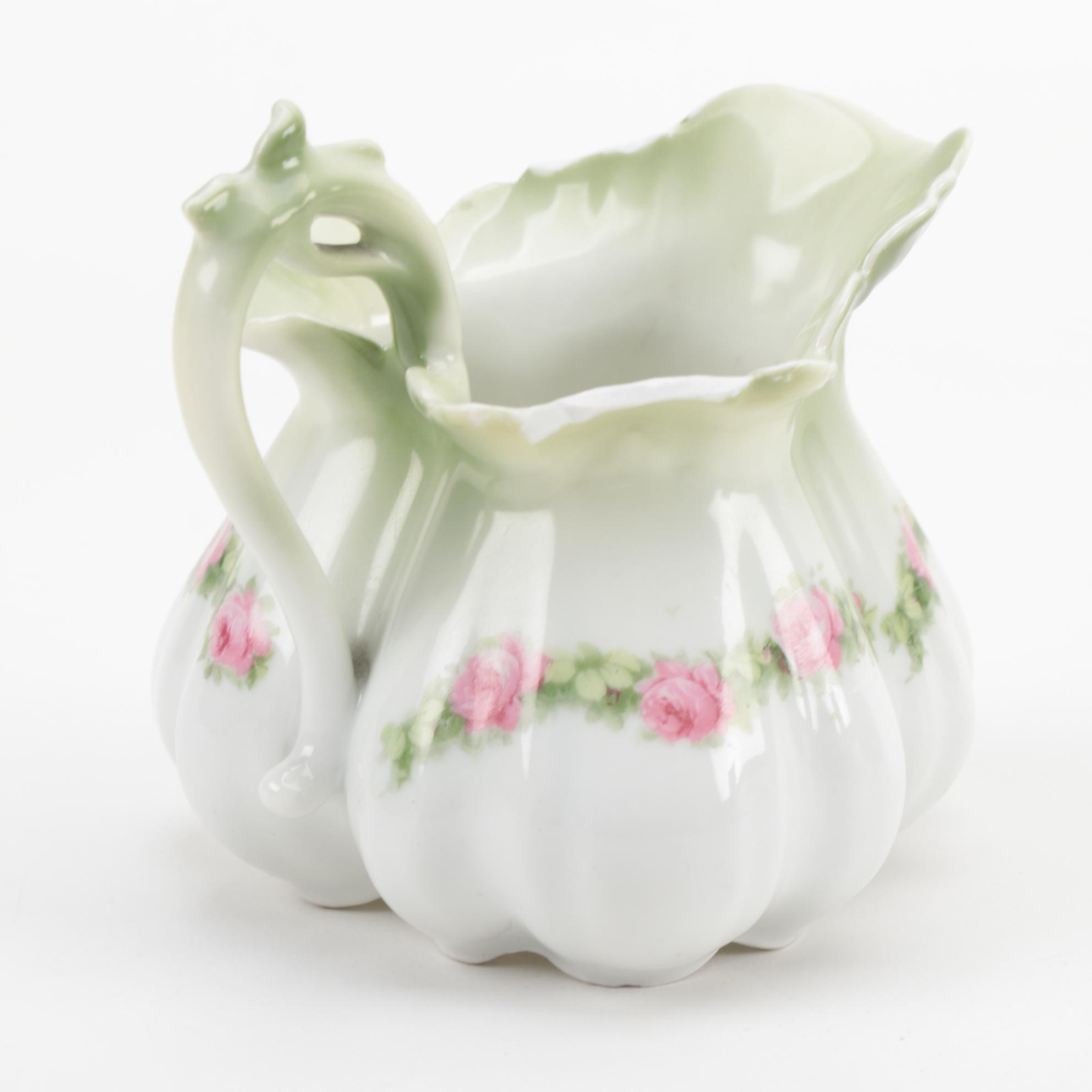 Rudolph Schlegelmilch Porcelain Creamer with Red Art Glass Creamers