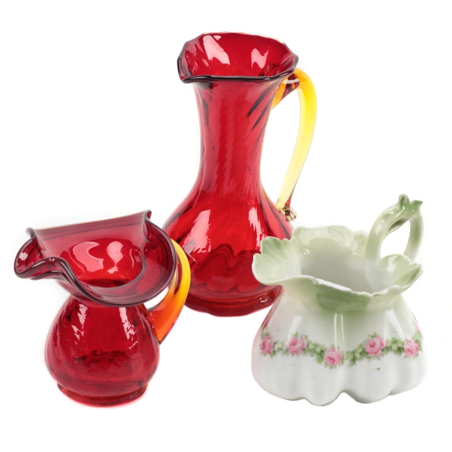 Rudolph Schlegelmilch Porcelain Creamer with Red Art Glass Creamers