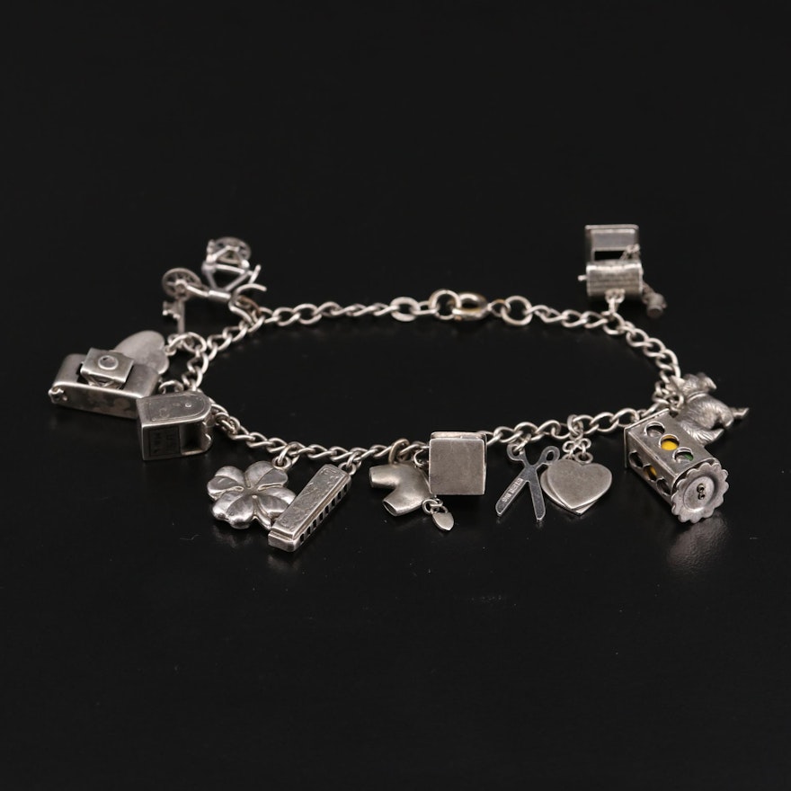 Vintage Sterling Silver Enamel Charm Bracelet Featuring Articulating Charms