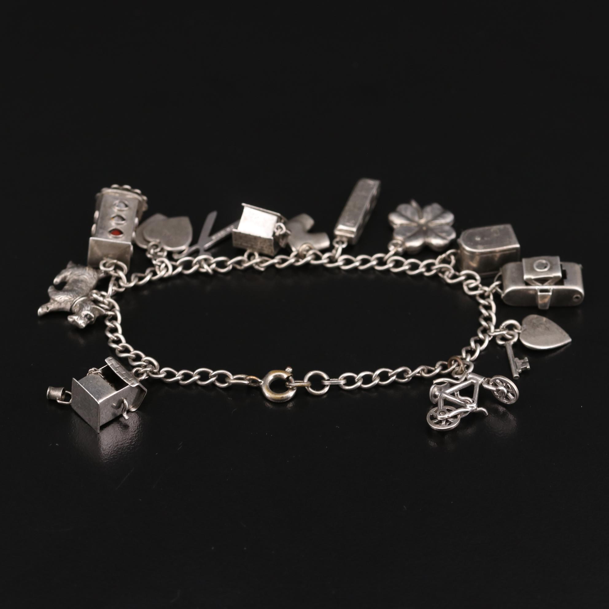 Vintage Sterling Silver Enamel Charm Bracelet Featuring Articulating Charms