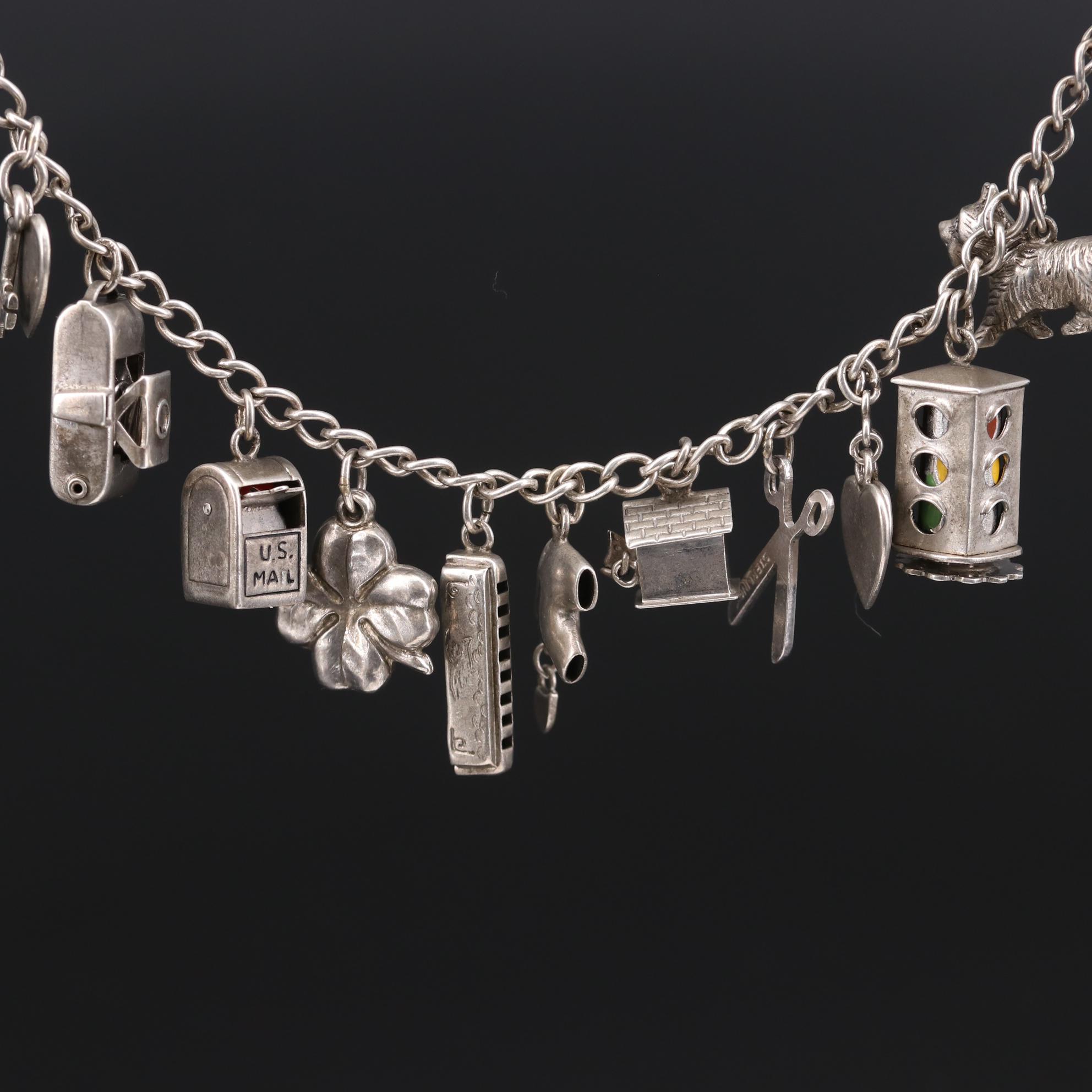 Vintage Sterling Silver Enamel Charm Bracelet Featuring Articulating Charms