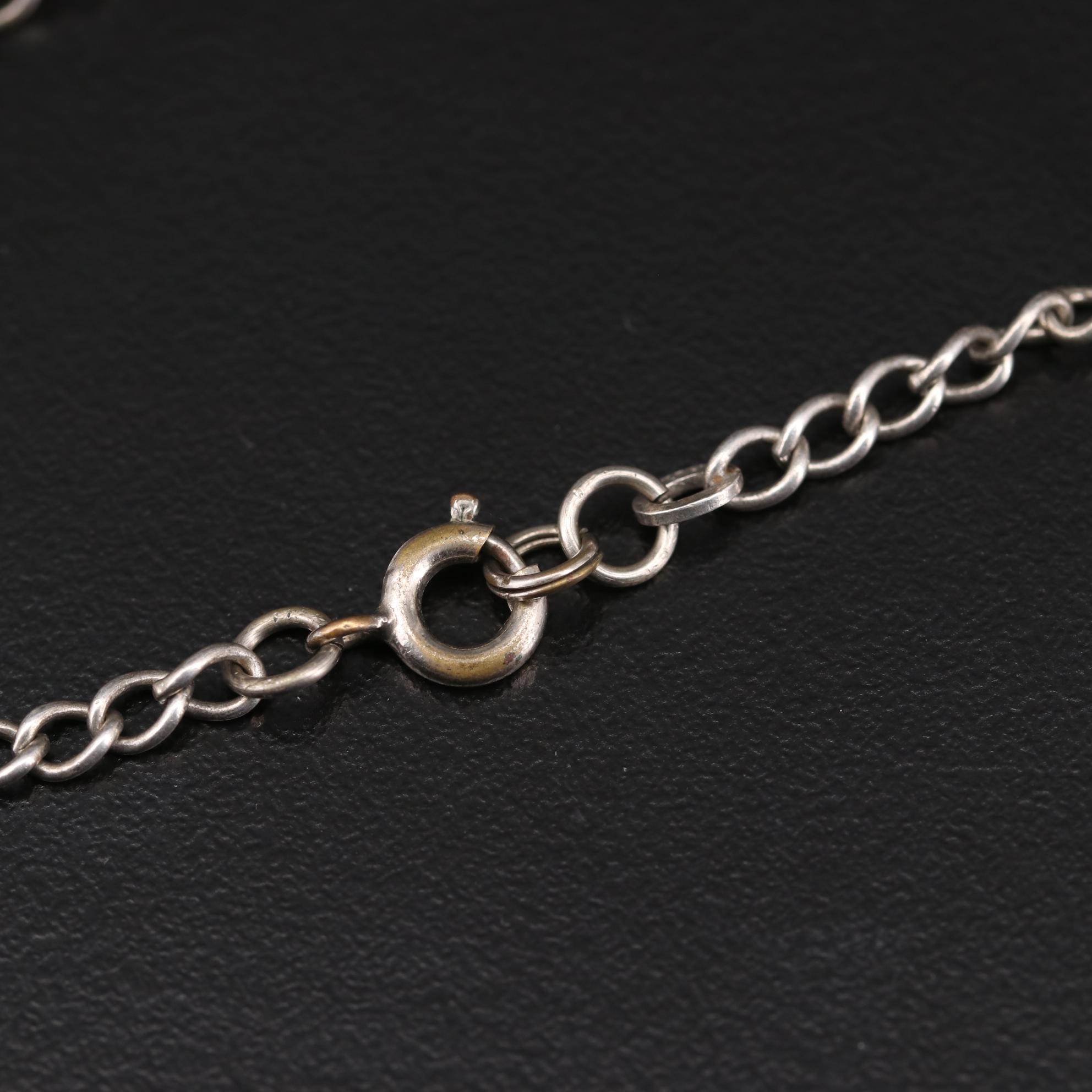 Vintage Sterling Silver Enamel Charm Bracelet Featuring Articulating Charms