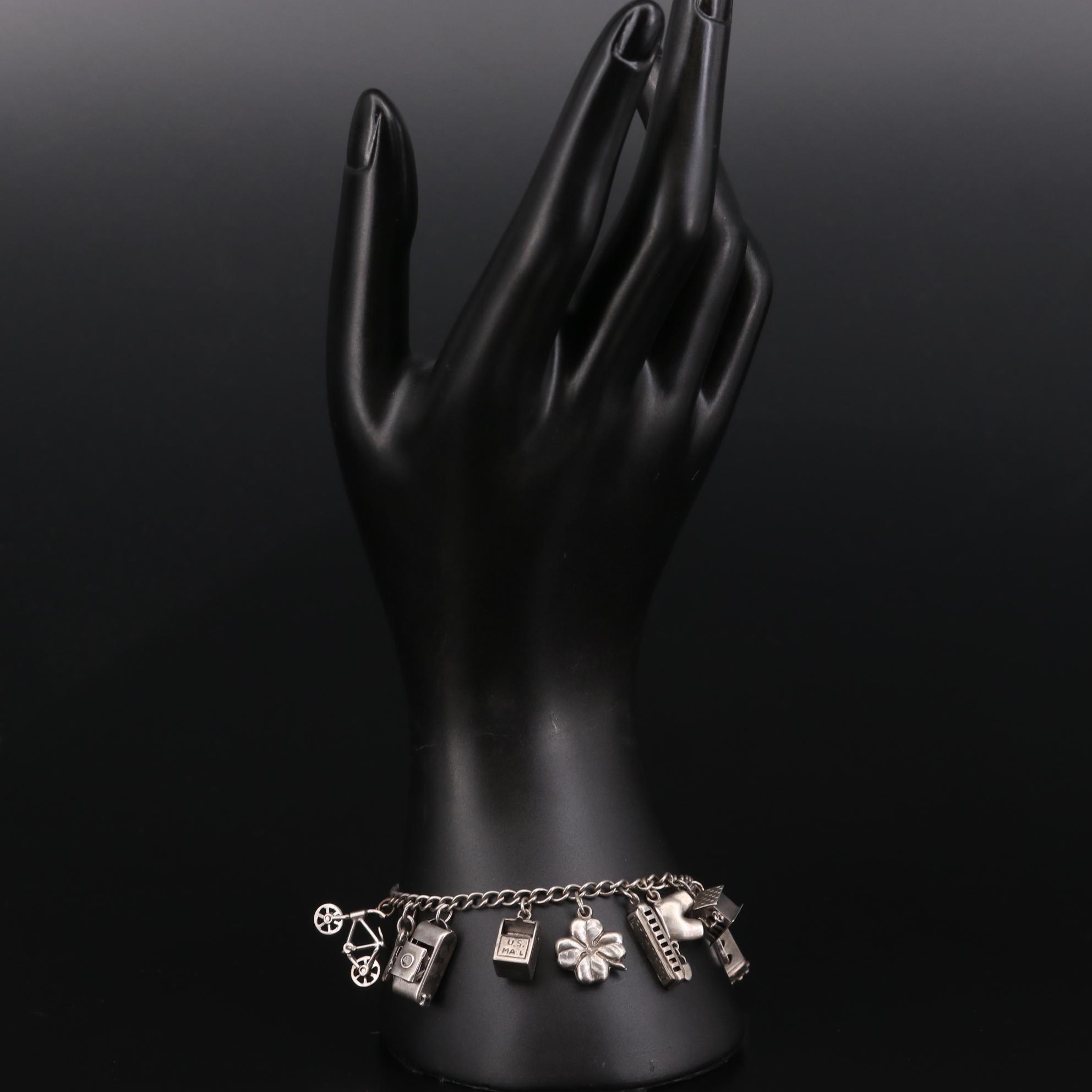 Vintage Sterling Silver Enamel Charm Bracelet Featuring Articulating Charms