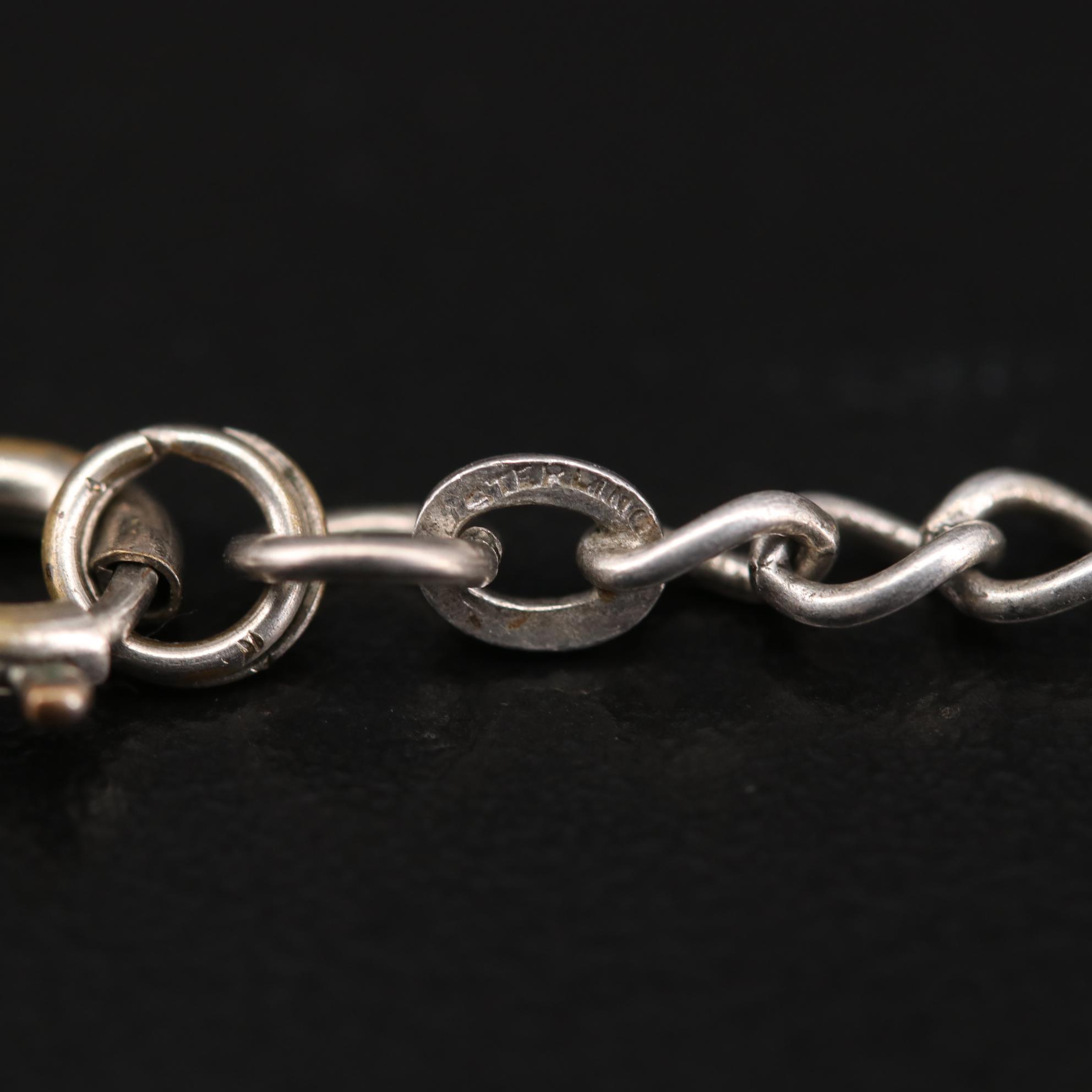 Vintage Sterling Silver Enamel Charm Bracelet Featuring Articulating Charms