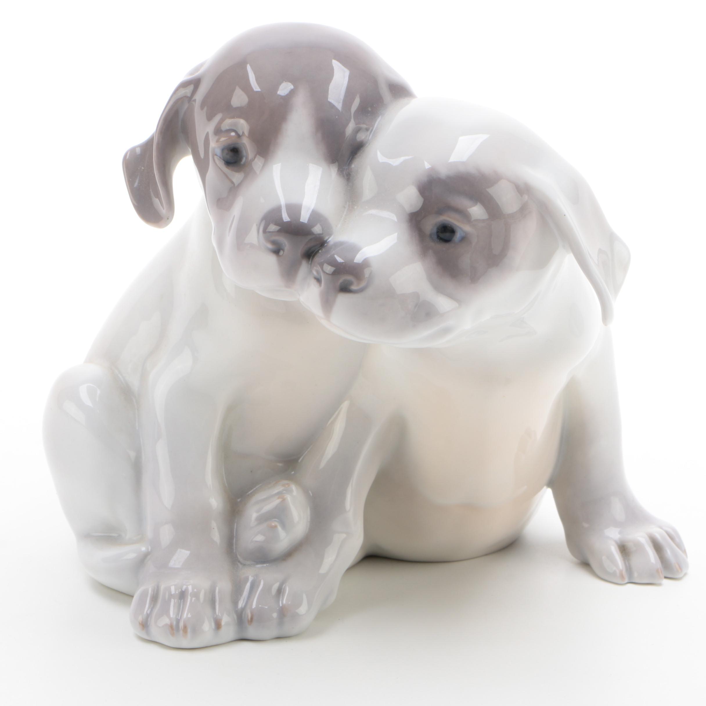 Royal Copenhagen "Pointer Puppies" and "Dachshund Puppy" Porcelain Figurines