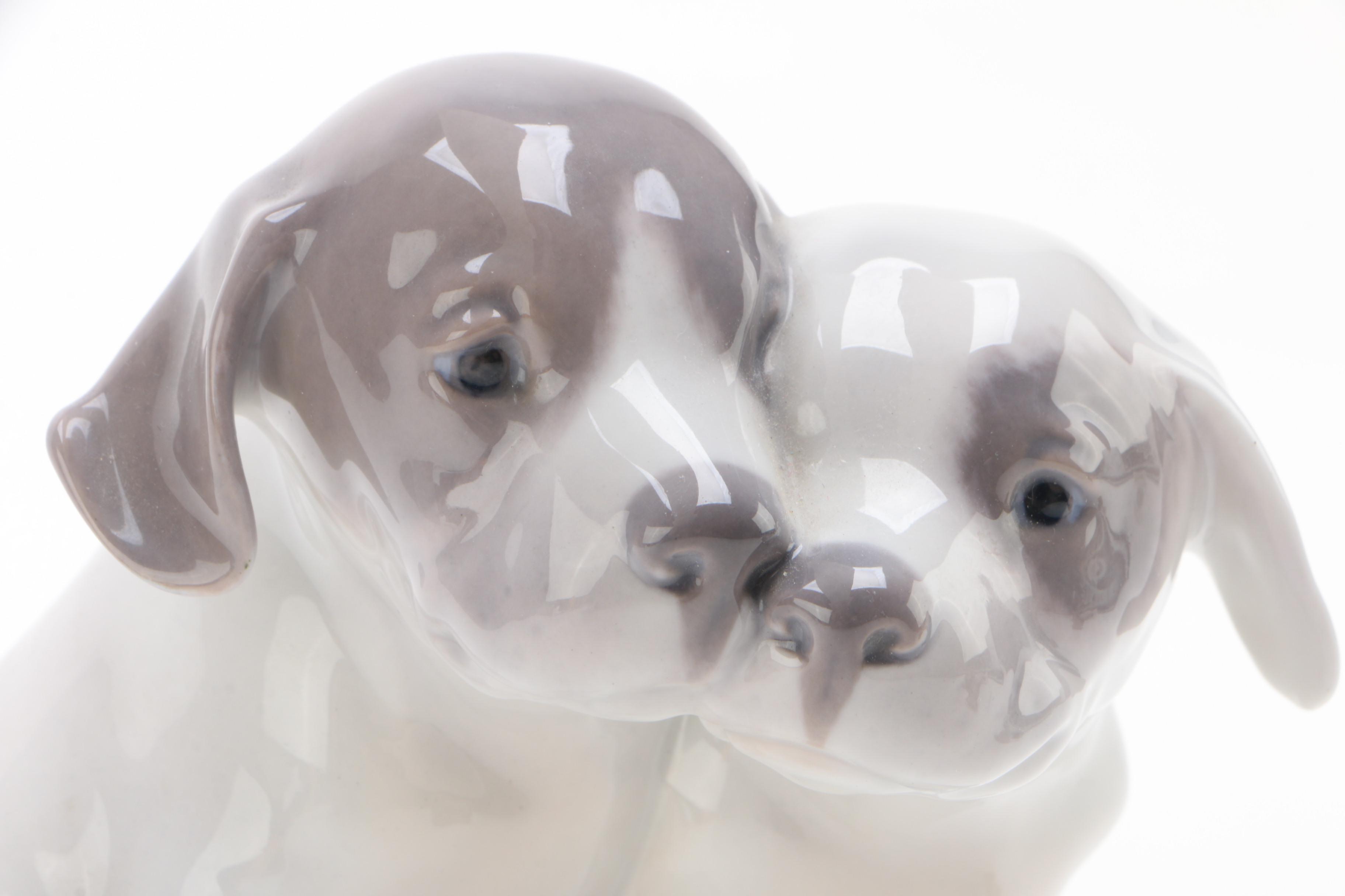 Royal Copenhagen "Pointer Puppies" and "Dachshund Puppy" Porcelain Figurines