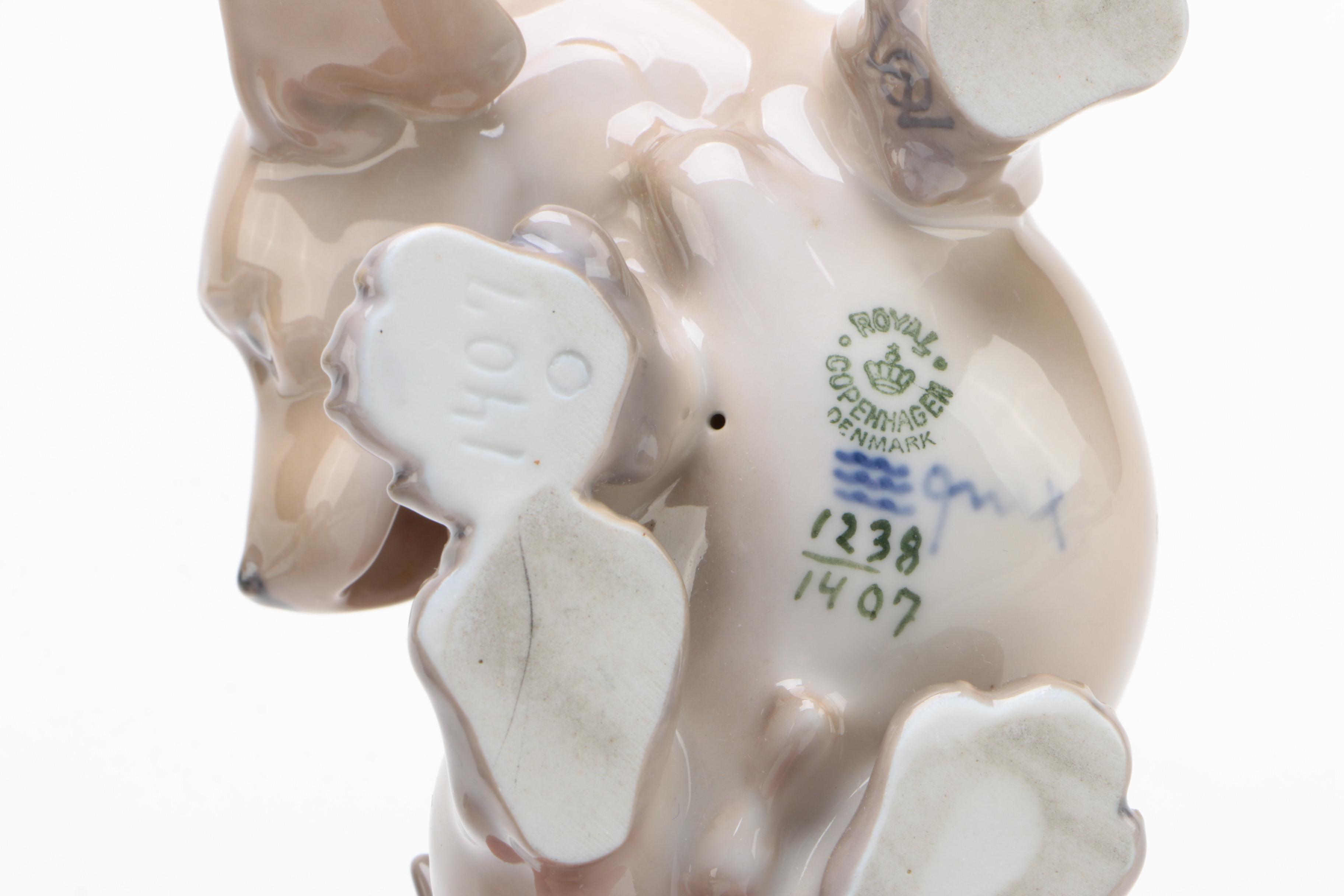 Royal Copenhagen "Pointer Puppies" and "Dachshund Puppy" Porcelain Figurines