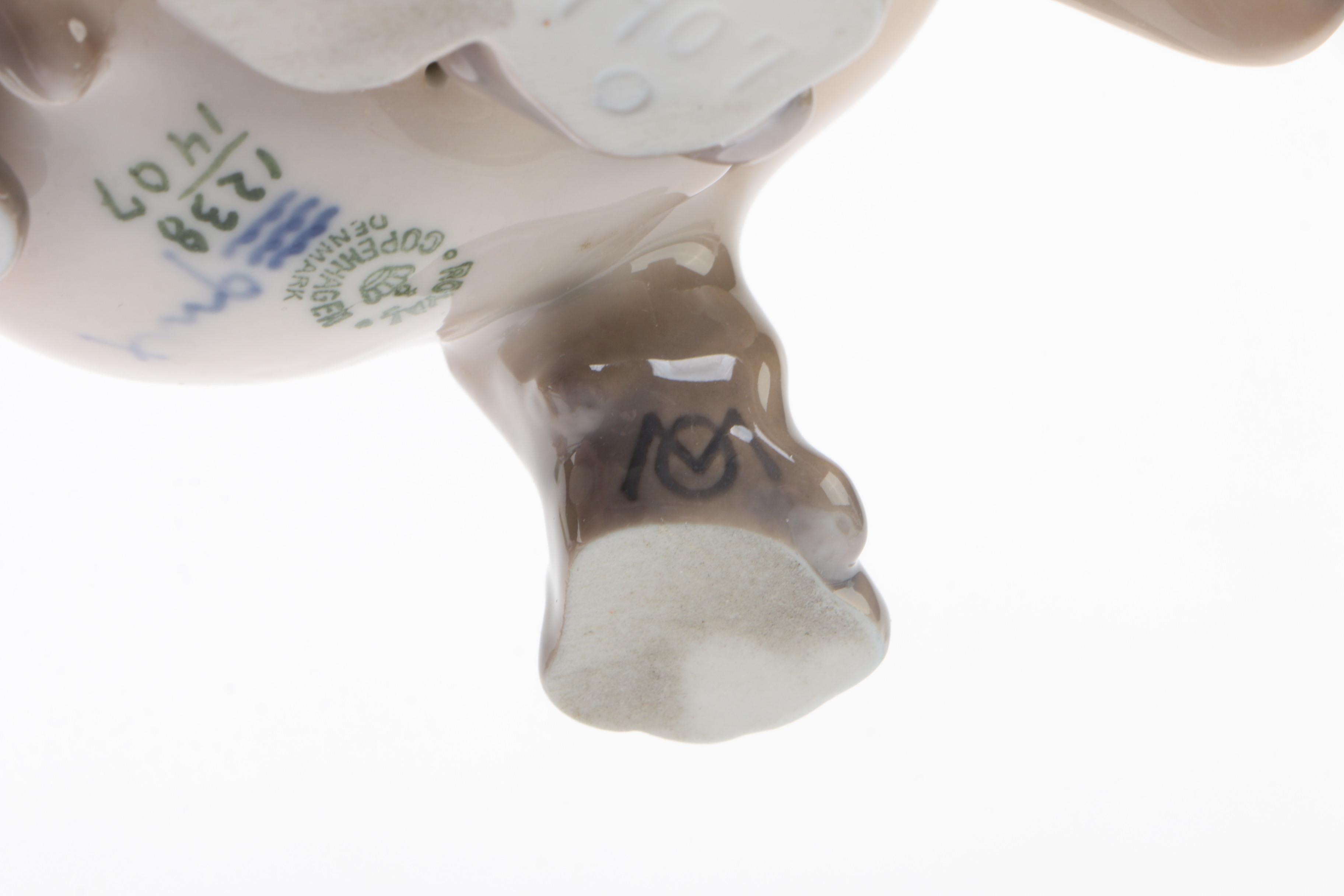 Royal Copenhagen "Pointer Puppies" and "Dachshund Puppy" Porcelain Figurines