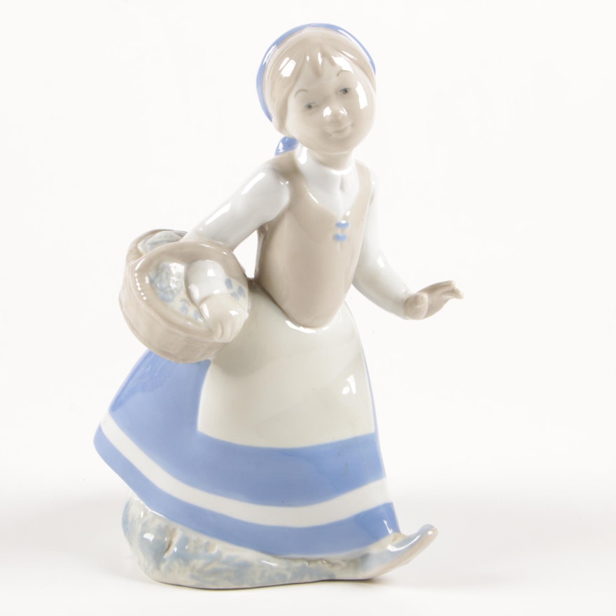 Rex Valencia Porcelain Figurine of Girl with Flower Basket
