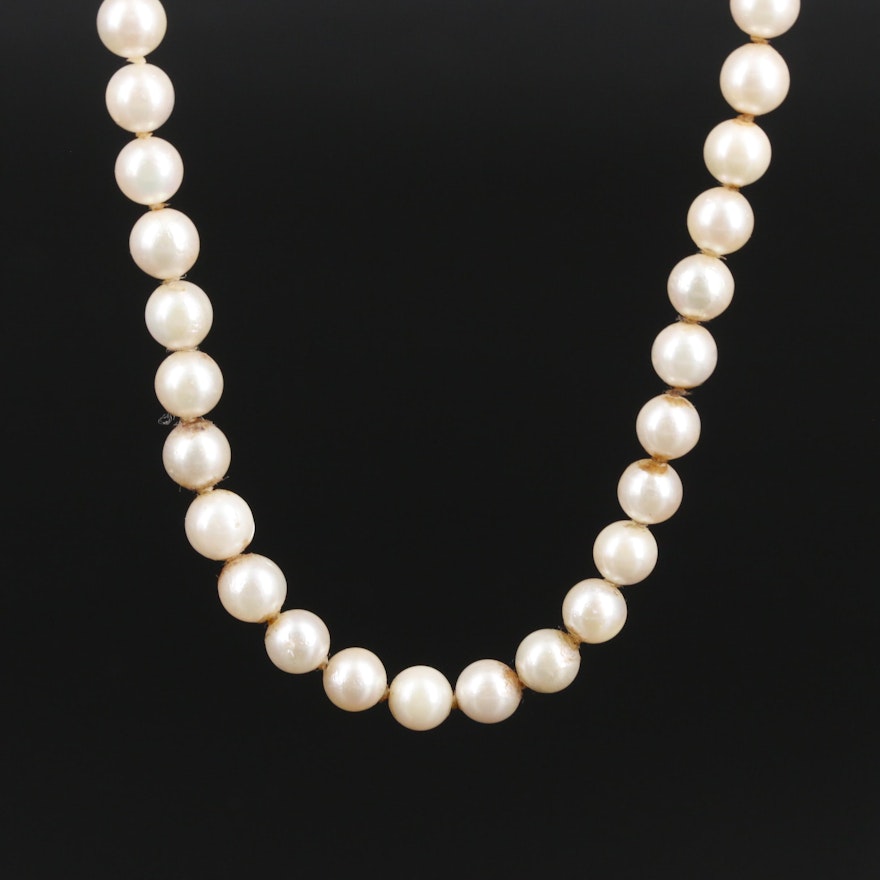 Knotted Strand of Pearls with 14K Yellow Gold Clasp