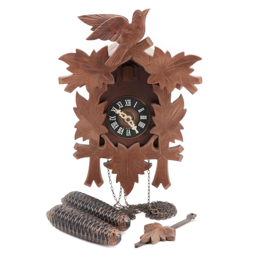 West German Wood Carved Cuckoo Clock With Pinecone Weights, circa 1970s-1980s