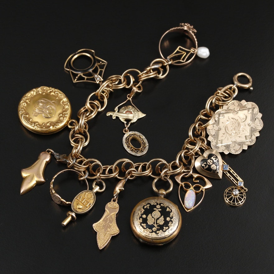 Vintage Charm Bracelet Including 10K Yellow Gold Charms and Gemstone Accents