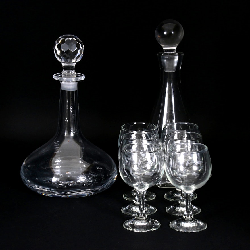 Orrefors Crystal Ships Decanter and Other Decanter with Etched Wine Glasses