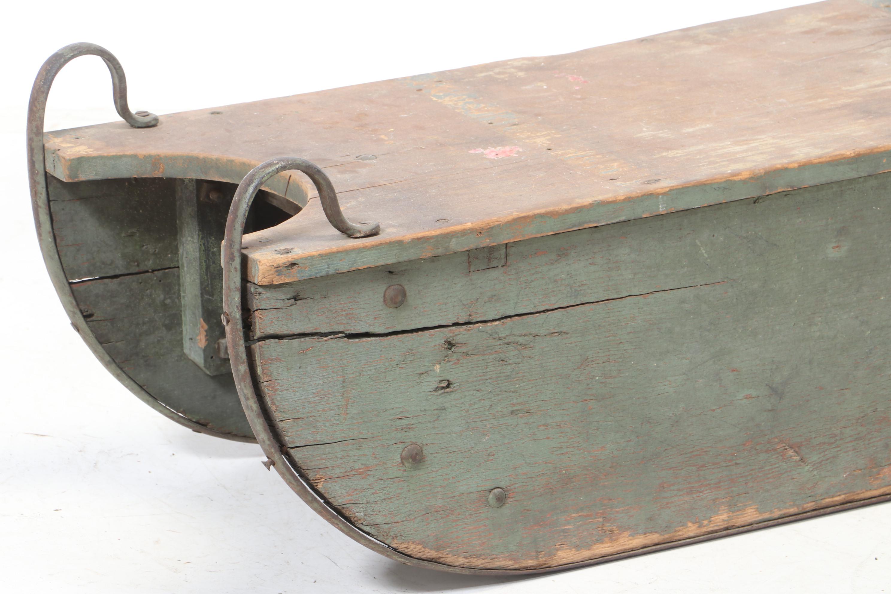 Painted Wooden Snow Sled with L.C. Company Bell, 20th Century