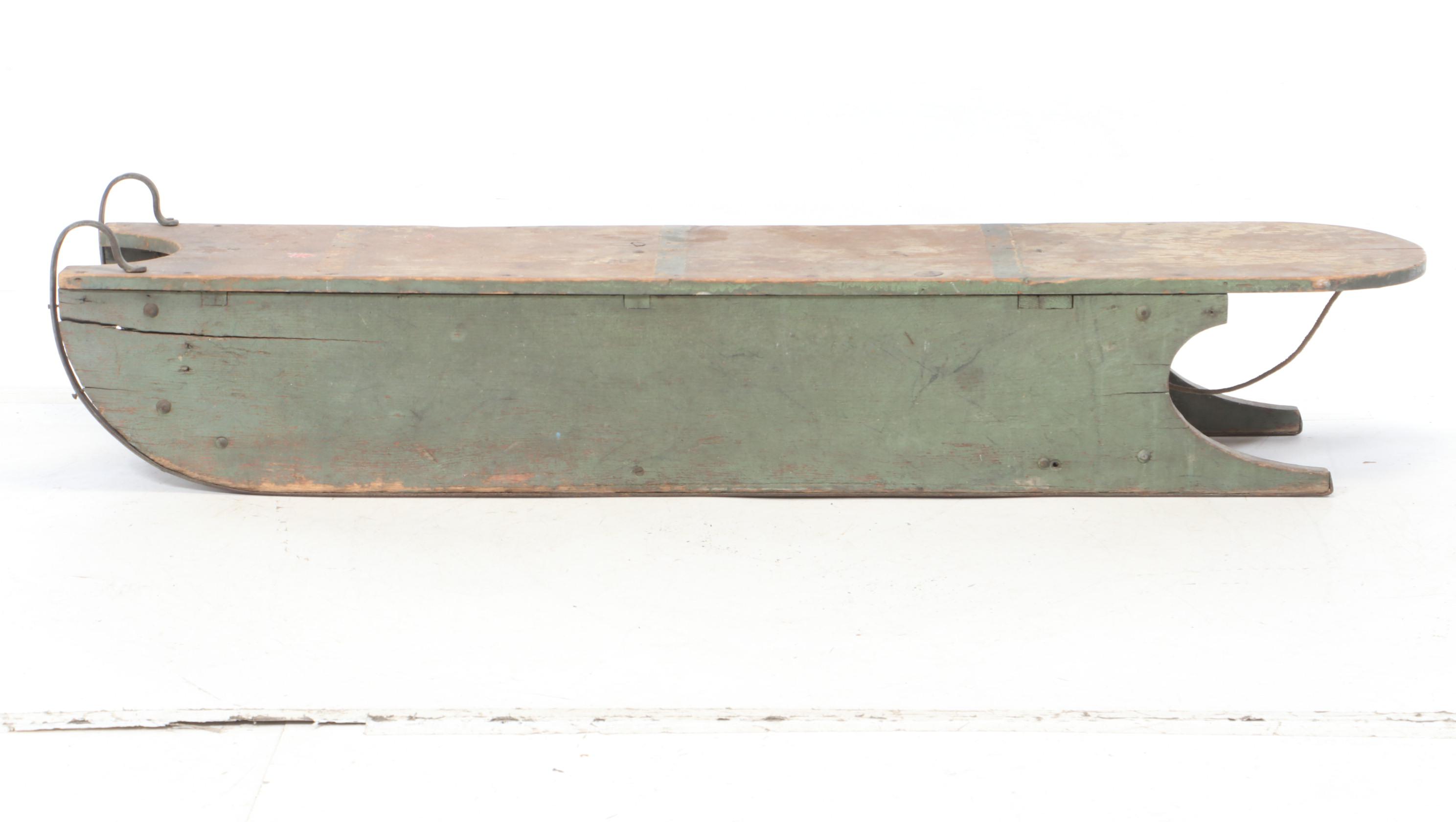 Painted Wooden Snow Sled with L.C. Company Bell, 20th Century