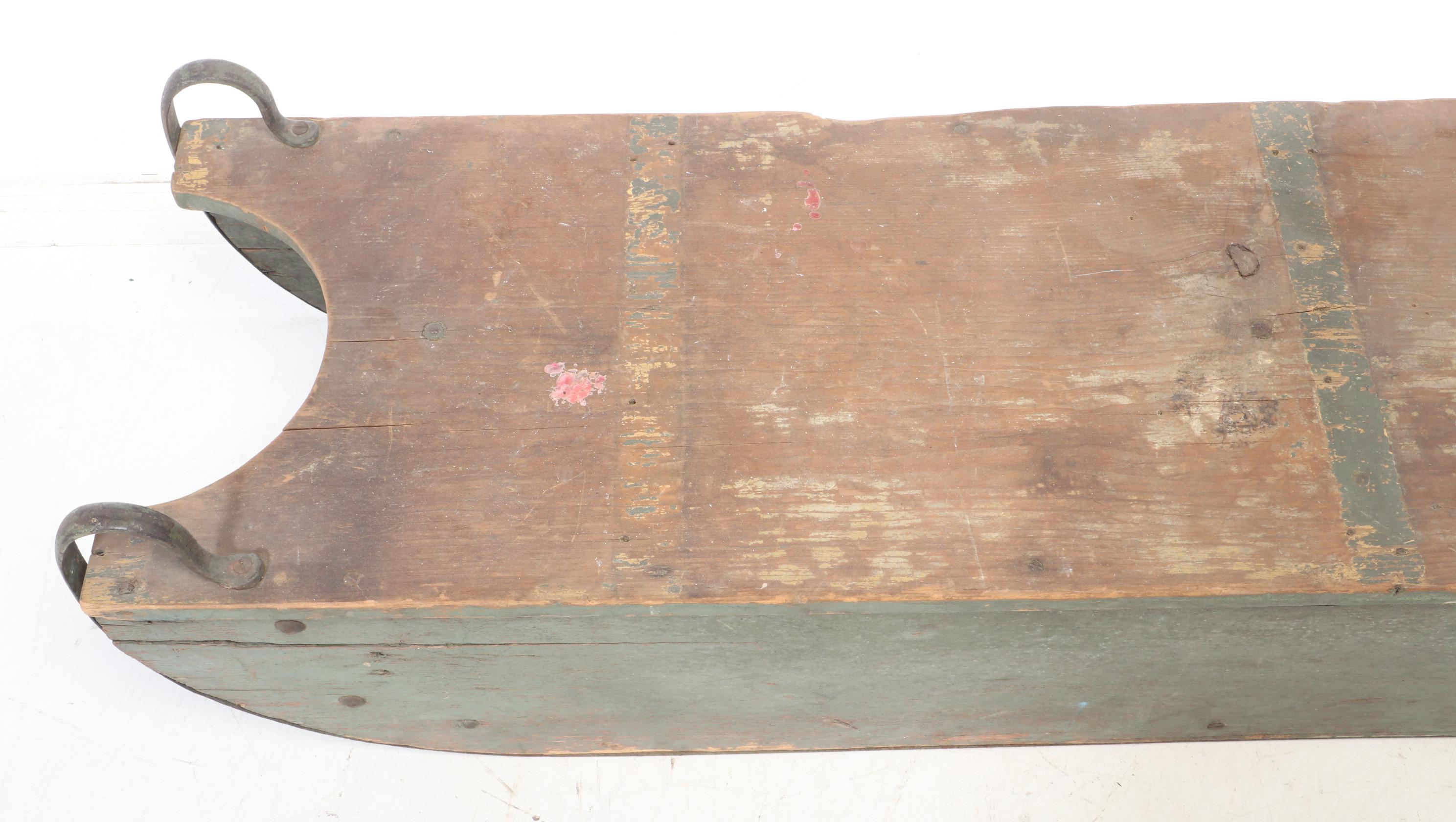 Painted Wooden Snow Sled with L.C. Company Bell, 20th Century