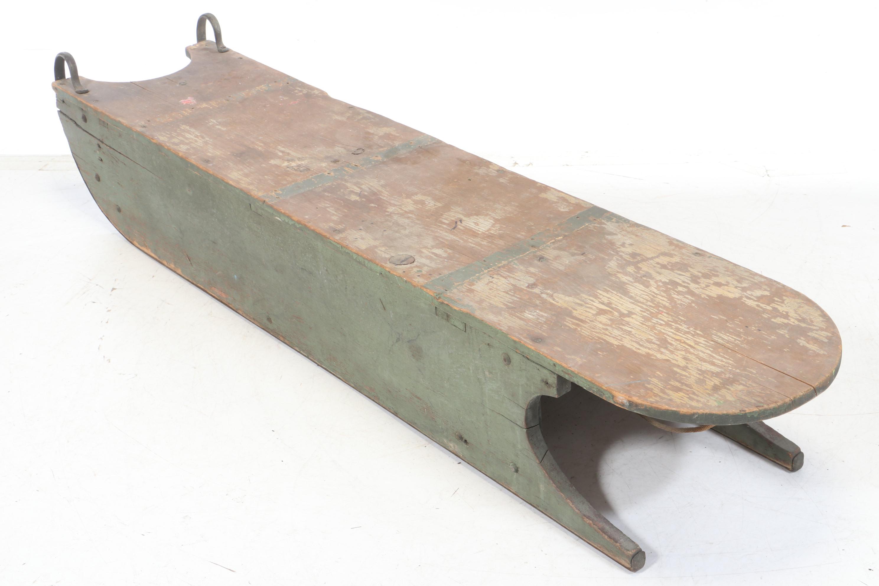 Painted Wooden Snow Sled with L.C. Company Bell, 20th Century