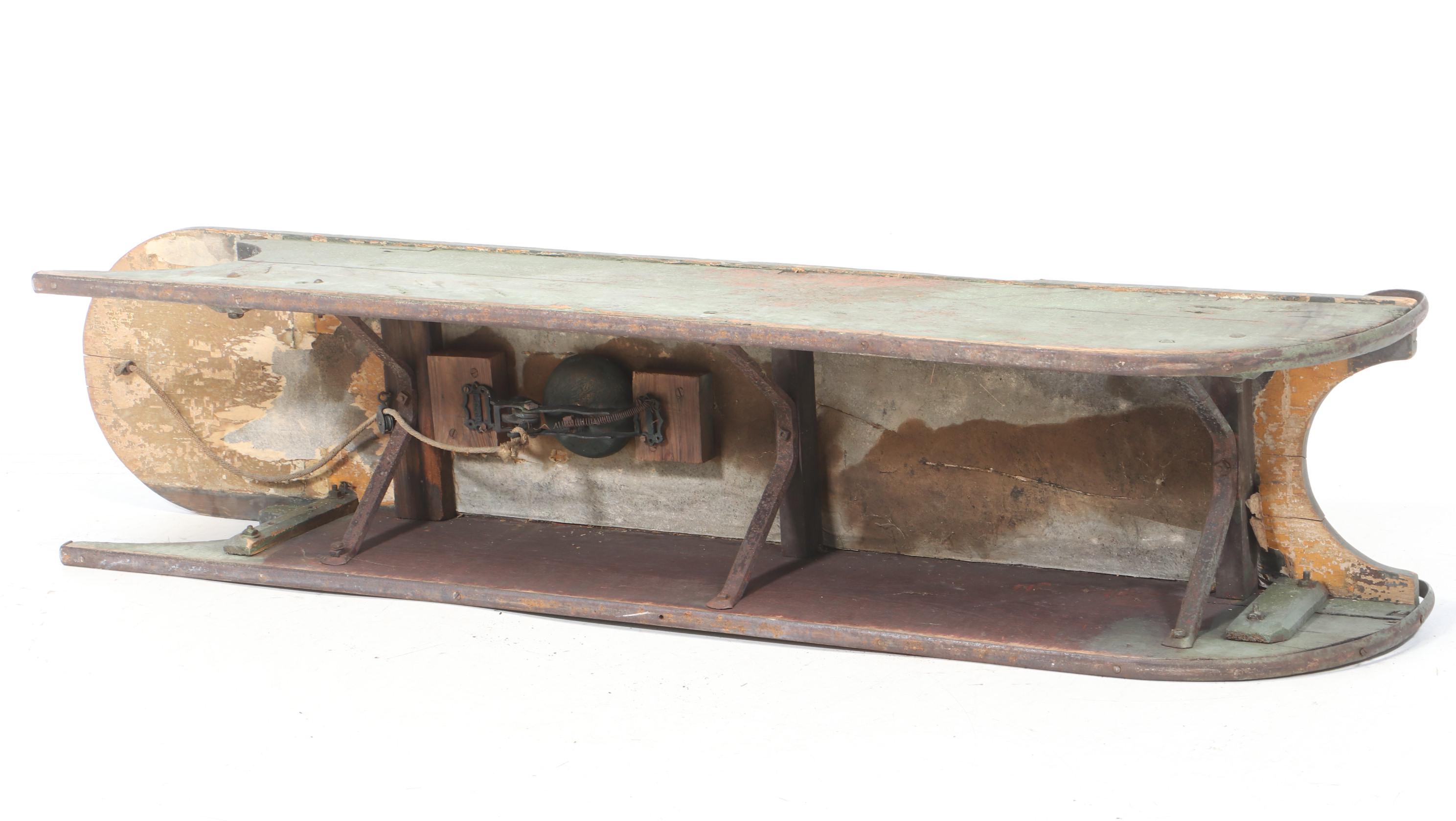 Painted Wooden Snow Sled with L.C. Company Bell, 20th Century