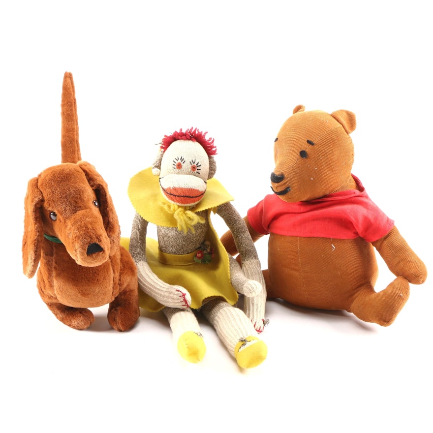 Sock Monkey, Winnie the Pooh, and Dachshund Dog Stuffed Animals