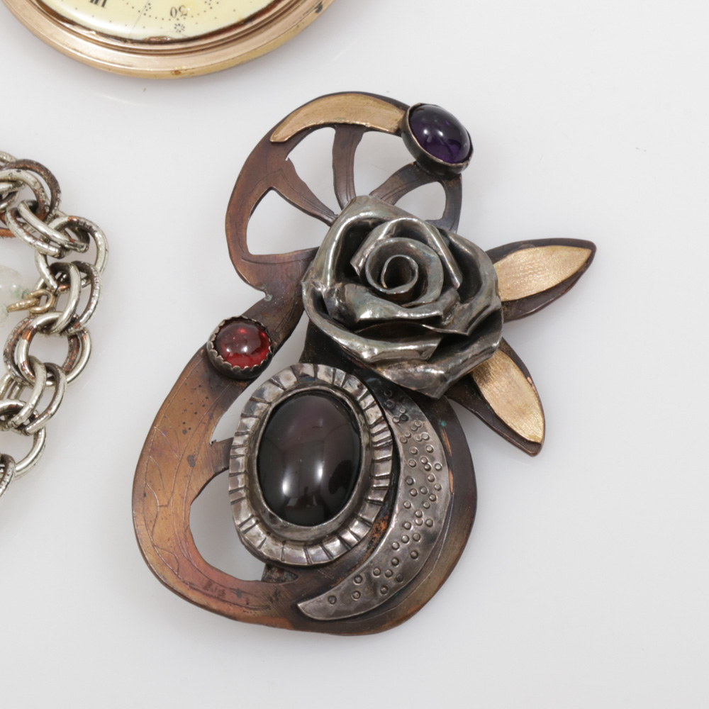 Assembled Brooches and Necklace Featuring Steampunk Motif Piece