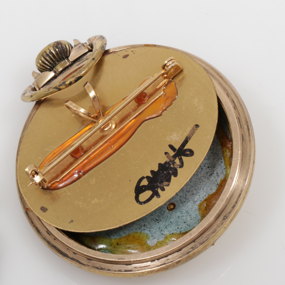 Assembled Brooches and Necklace Featuring Steampunk Motif Piece