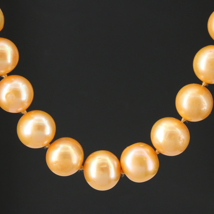 Strand of Orange Pearls with 14K Yellow Gold Clasp