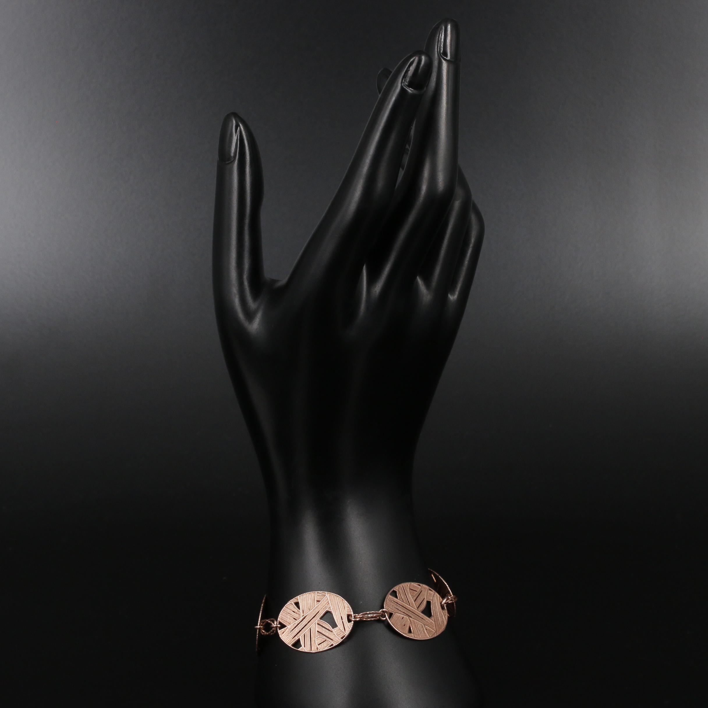 Sterling Silver Bracelet Featuring Woven Motif