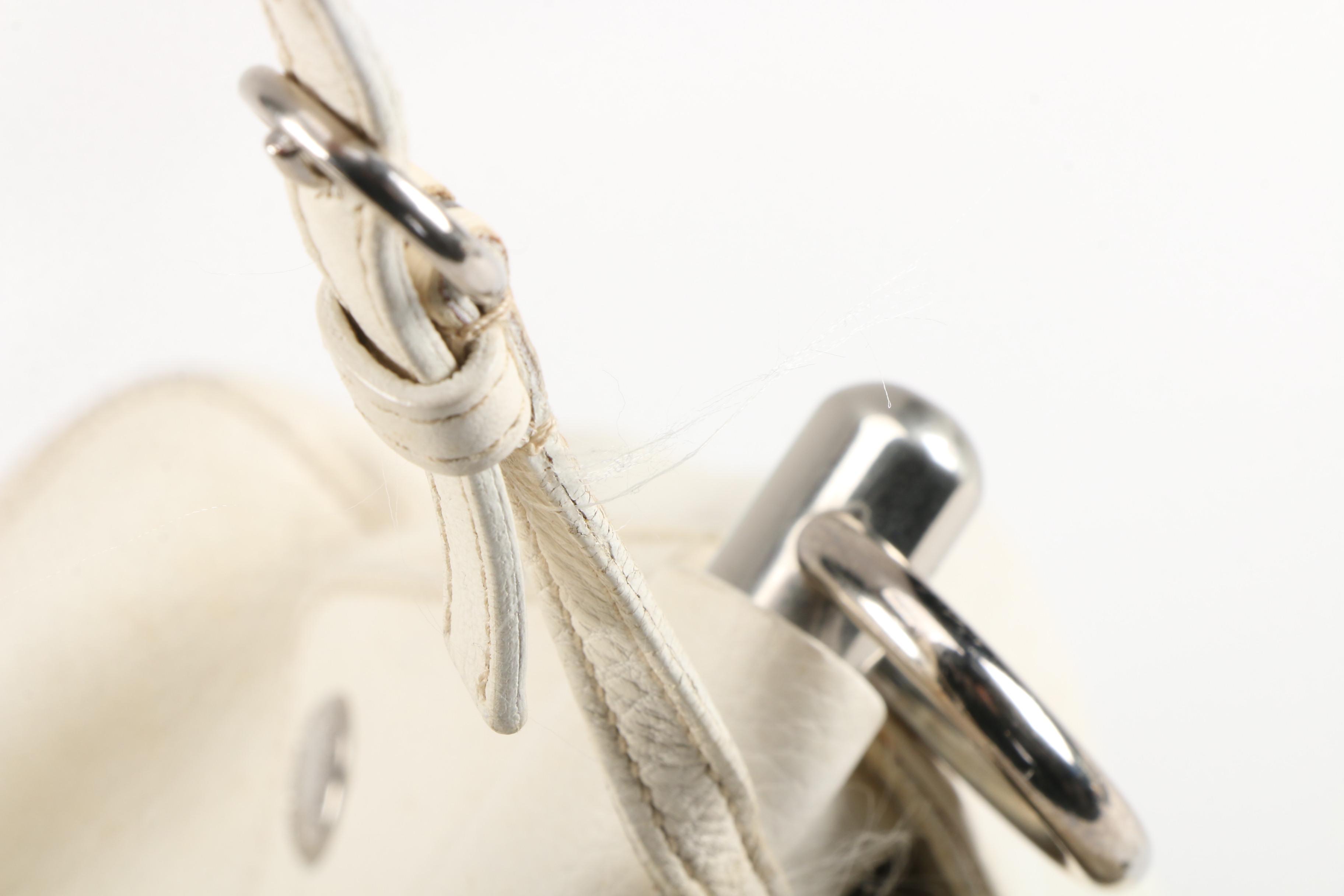 Prada Convertible Bar Handle Clutch in Pebbled Vitello Daino Calfskin Leather