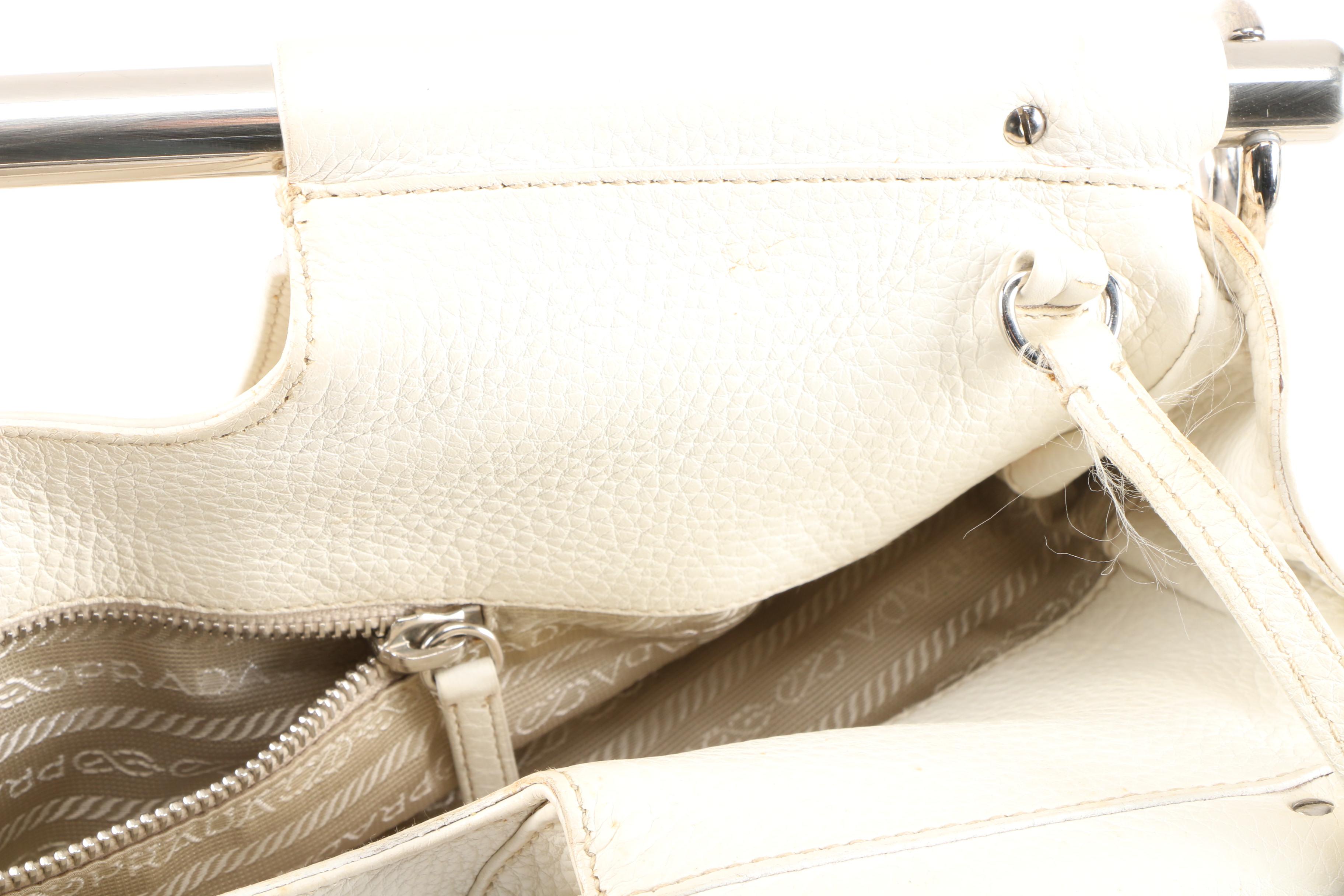 Prada Convertible Bar Handle Clutch in Pebbled Vitello Daino Calfskin Leather