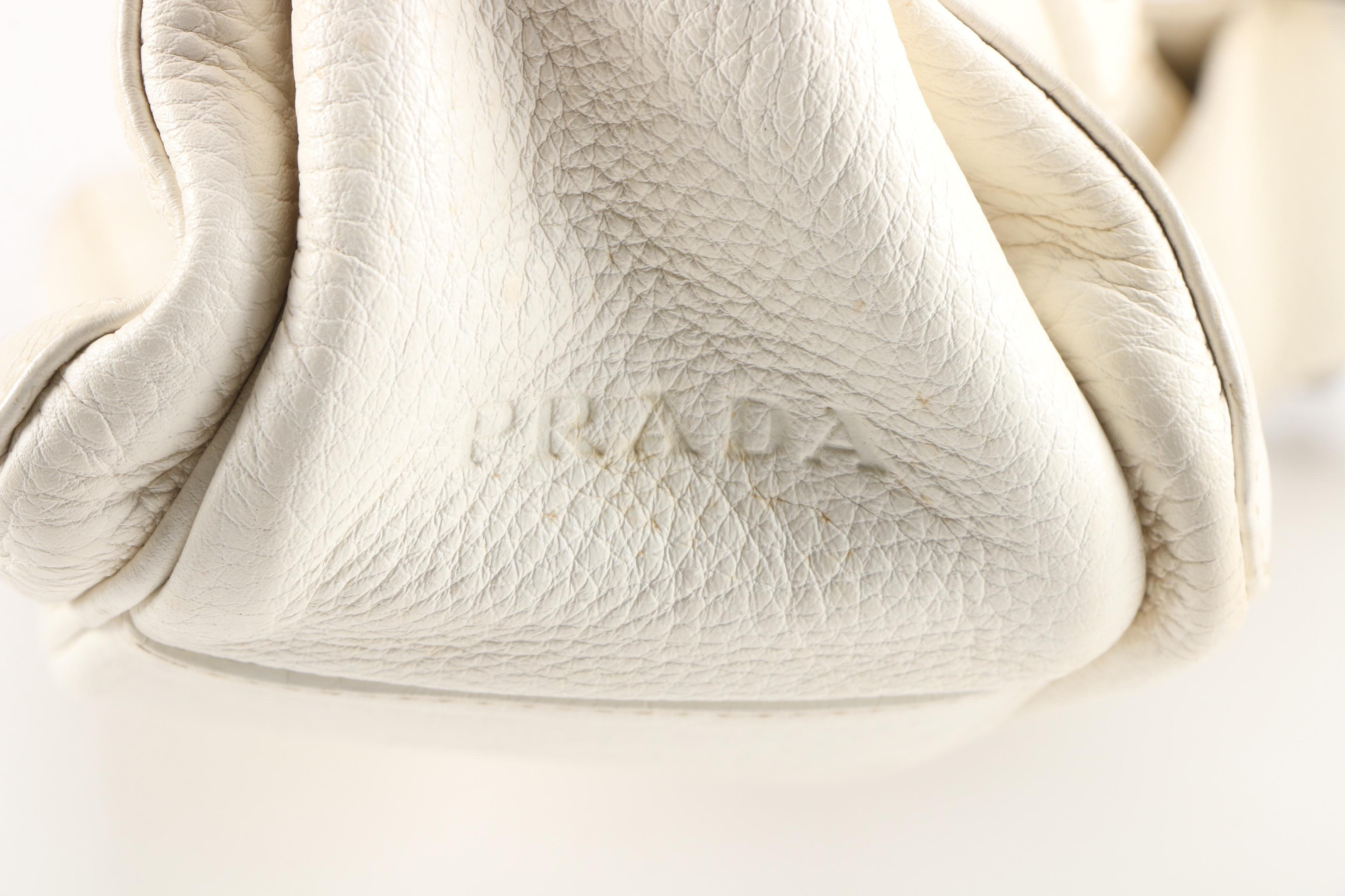 Prada Convertible Bar Handle Clutch in Pebbled Vitello Daino Calfskin Leather