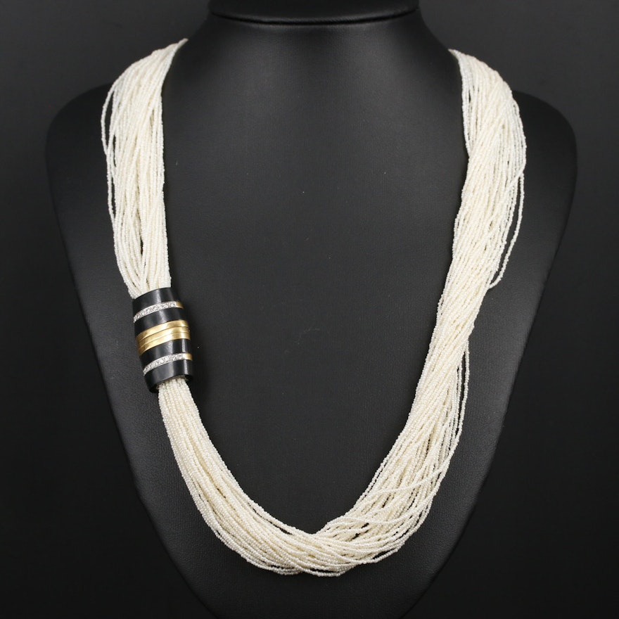 Seed Pearl Multi-Strand Necklace Featuring 18K Gold Diamond and Black Onyx Clasp