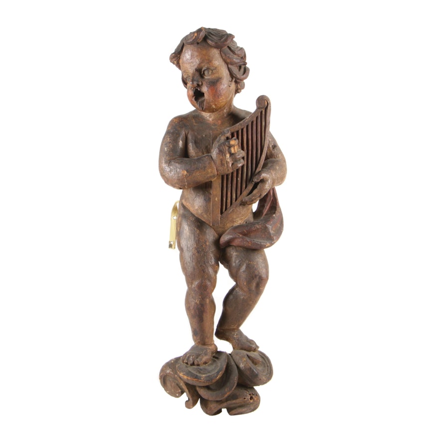 Carved and Polychromed Pine Putto with Harp, 18th Century