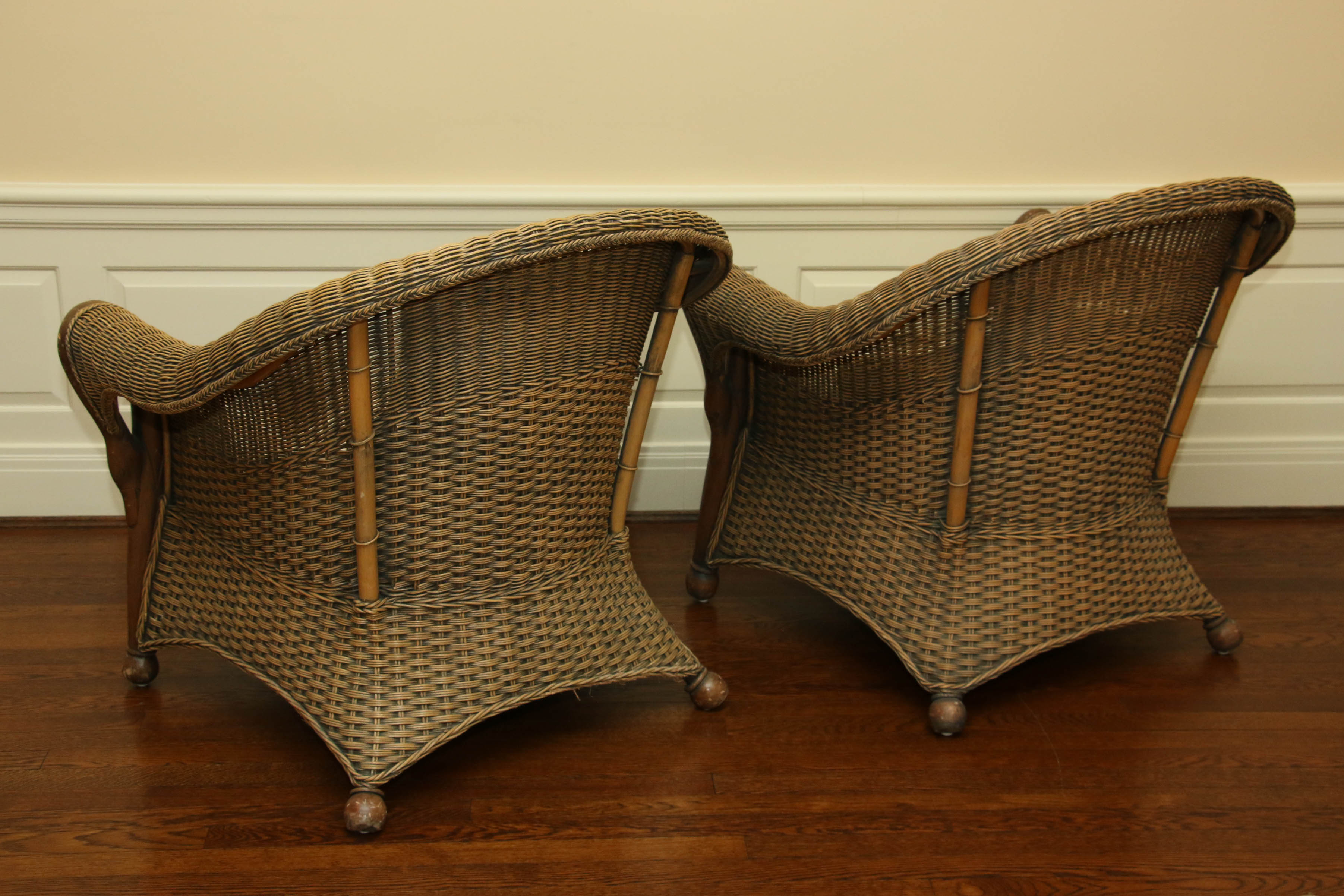 Pair of Wicker Armchairs with Duck-Carved Arms Plus Footstool and Accent Pillows