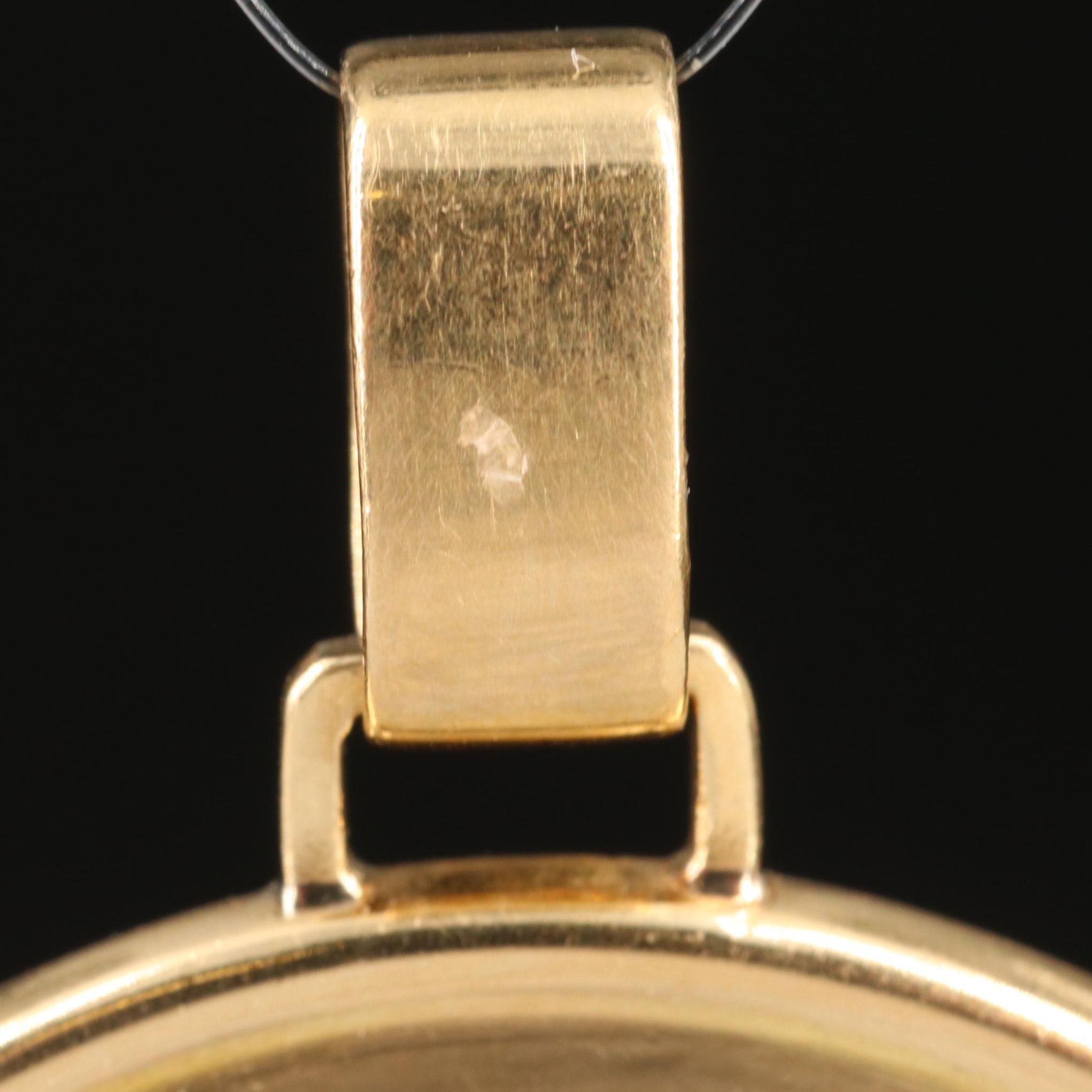 Cartier 18K Gold Zodiac Pendant