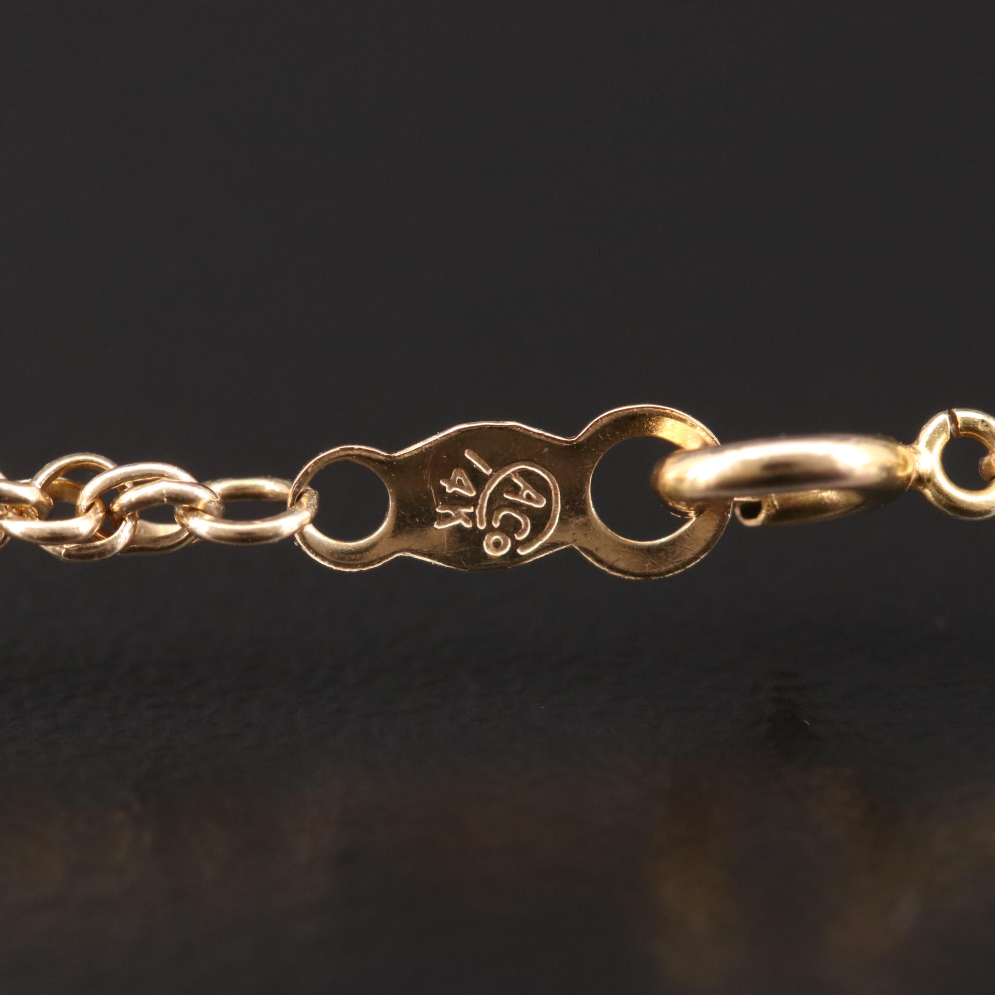 14K Yellow Gold Diamond Pendant Necklace Featuring French Love Saying