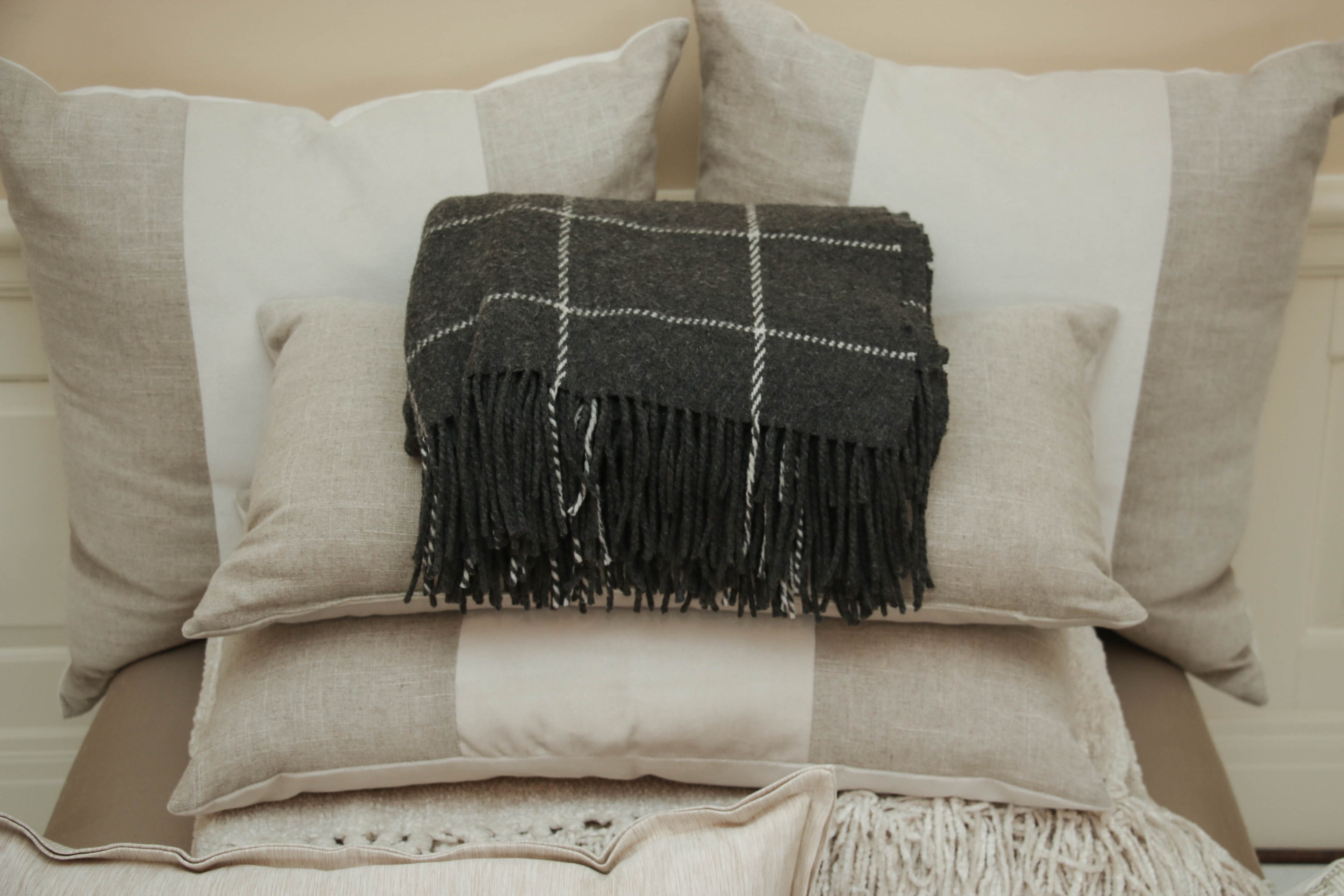 Tufted Upholstered Bench, Decorative Pillows and Throw Blankets